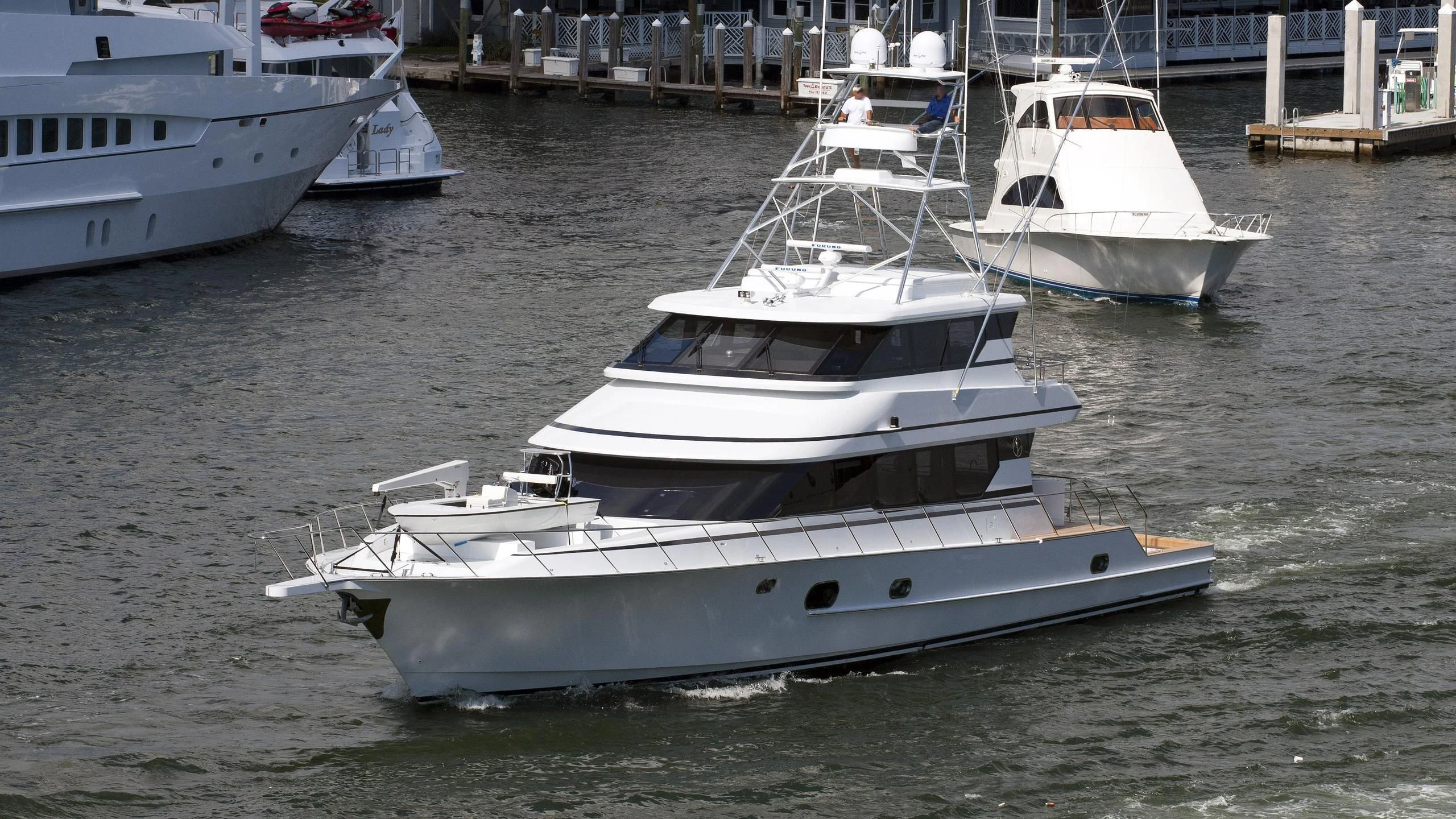 a group of boats in a harbor aboard GRAND LEGACY Yacht for Sale
