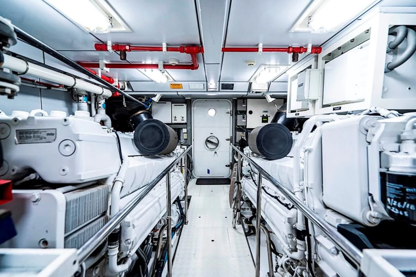 a room with white machines aboard GRAND LEGACY Yacht for Sale