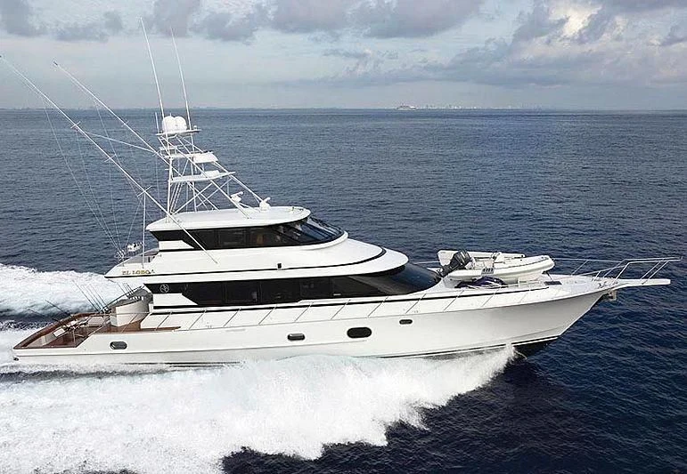 a white yacht in the water aboard GRAND LEGACY Yacht for Sale