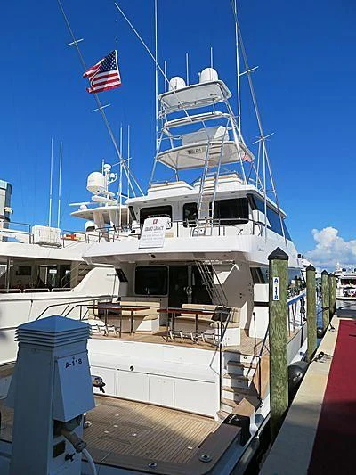a boat with a flag on the front aboard GRAND LEGACY Yacht for Sale