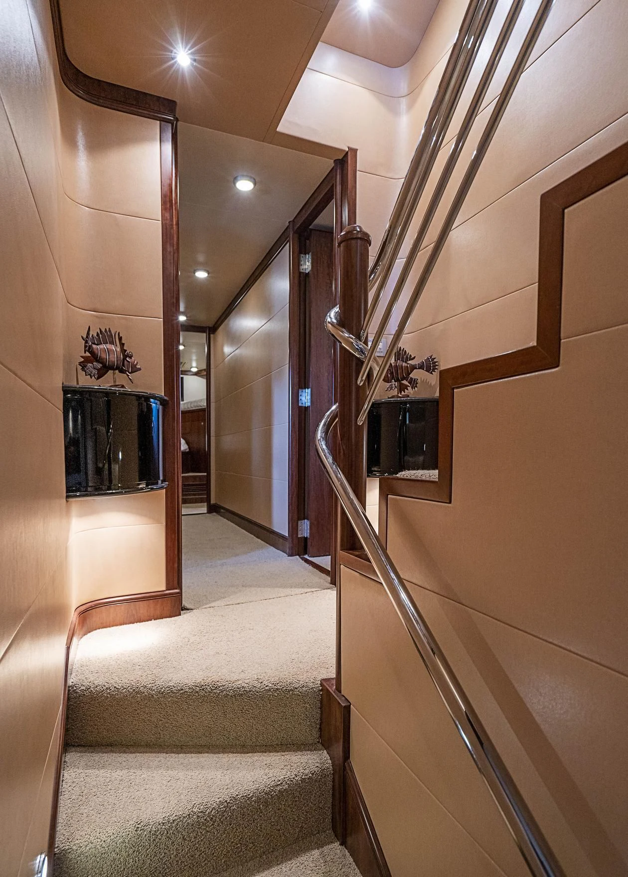a hallway with a staircase aboard GRAND LEGACY Yacht for Sale