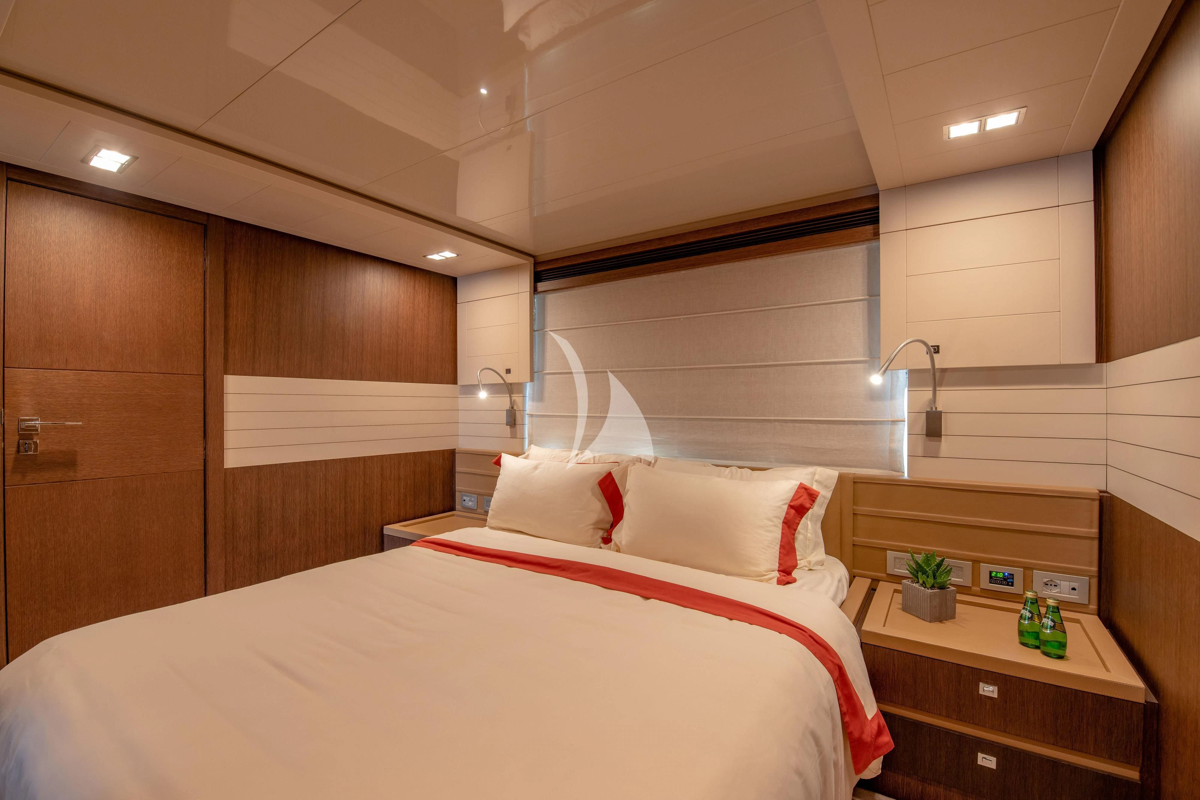 a bed in a room aboard INFINITAS Yacht for Charter
