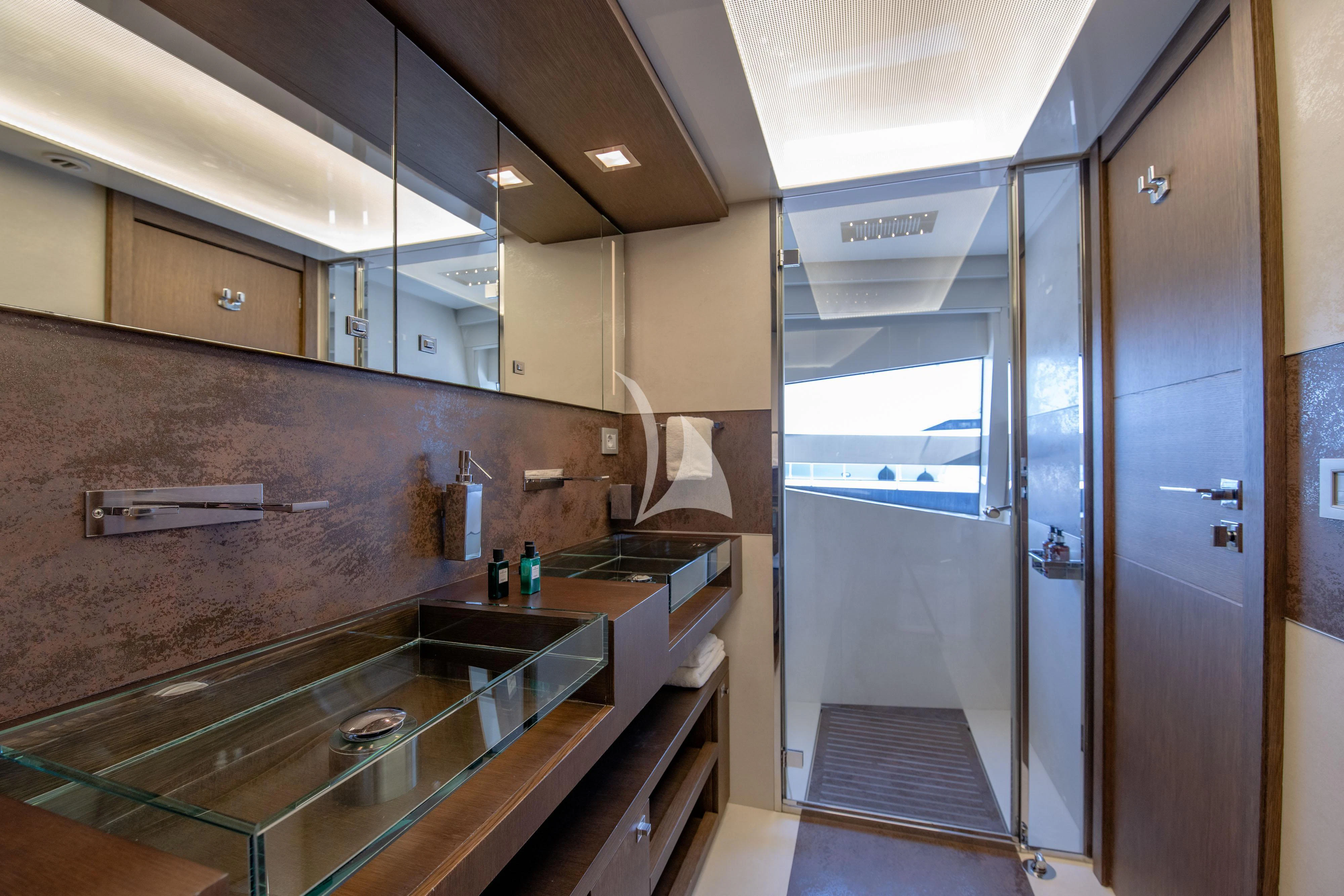 a kitchen with stainless steel appliances aboard INFINITAS Yacht for Charter