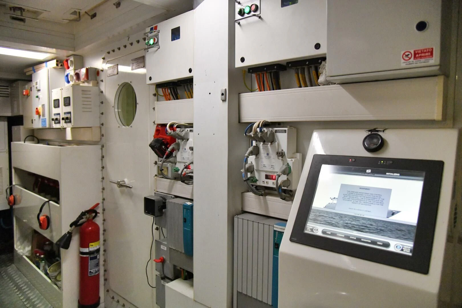 a computer in a laboratory aboard INFINITAS Yacht for Charter