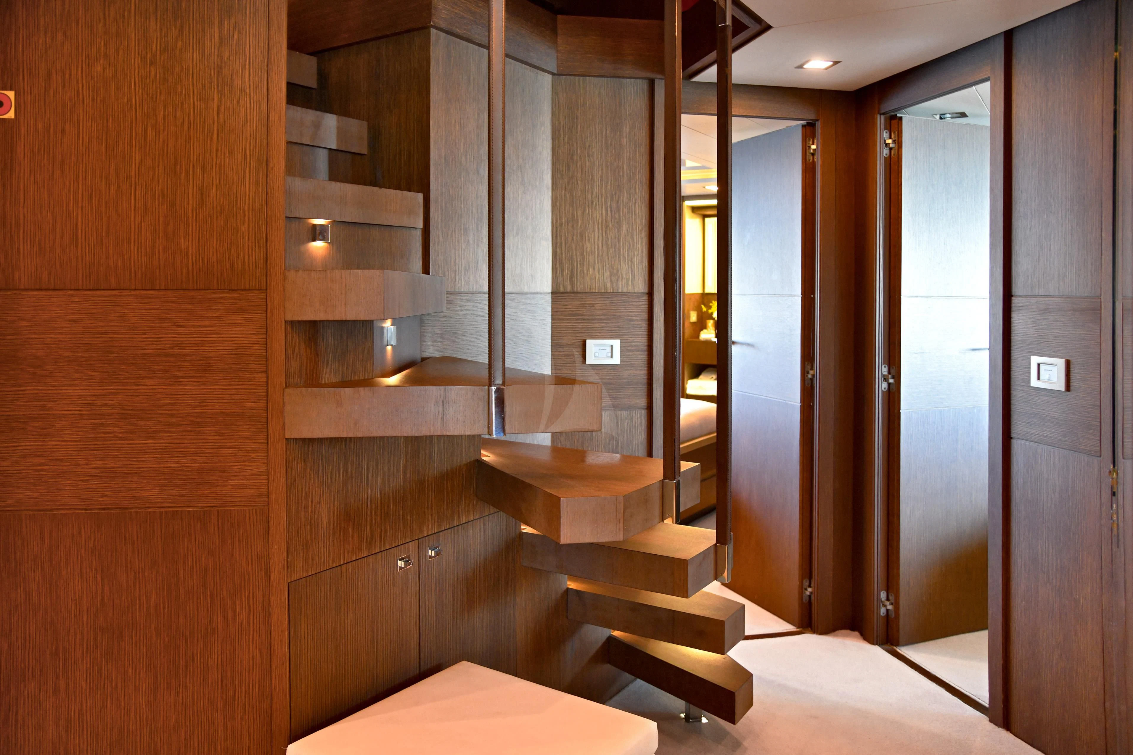 a room with a large glass door aboard INFINITAS Yacht for Charter