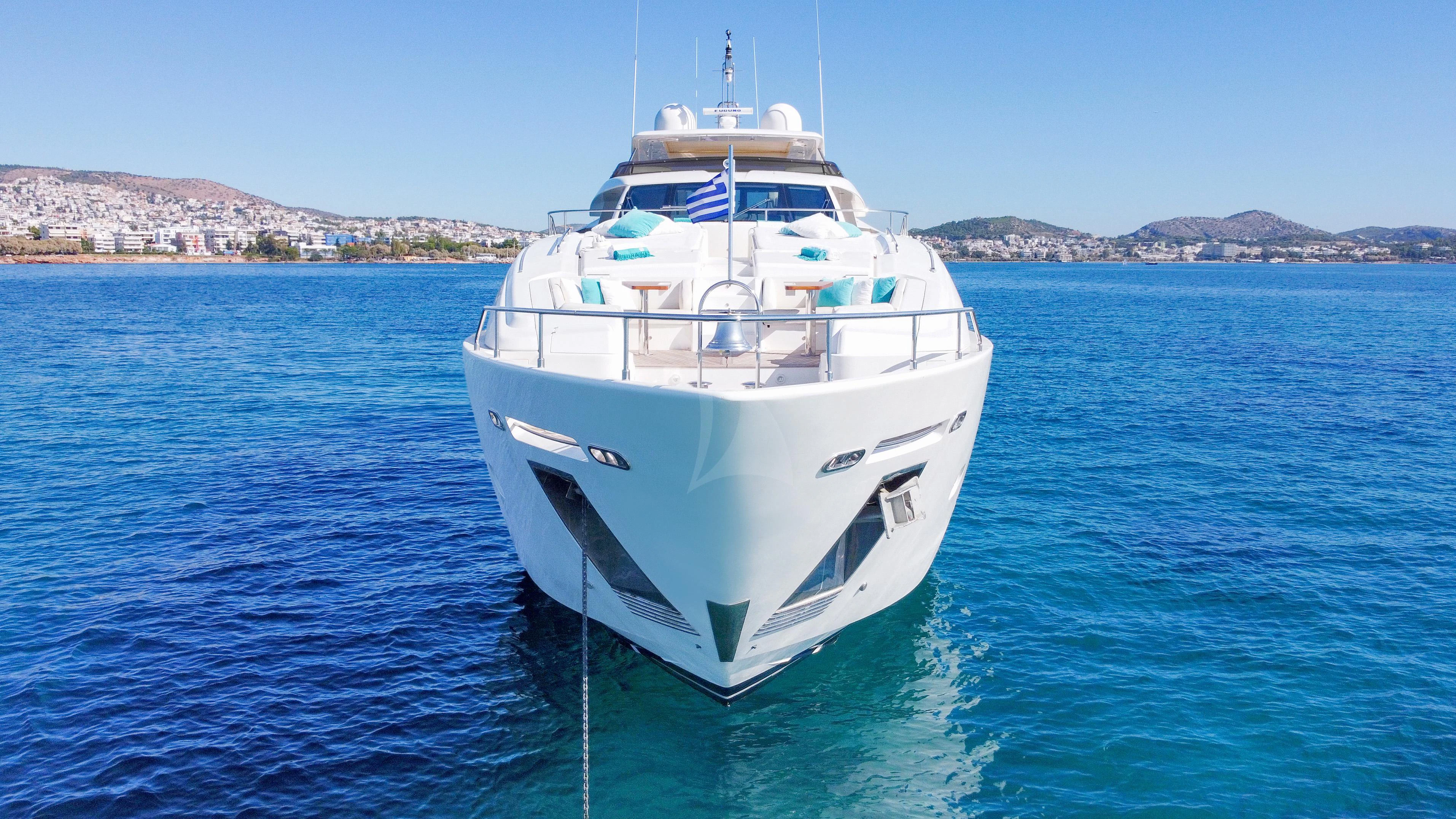 a white boat in the water aboard INFINITAS Yacht for Charter