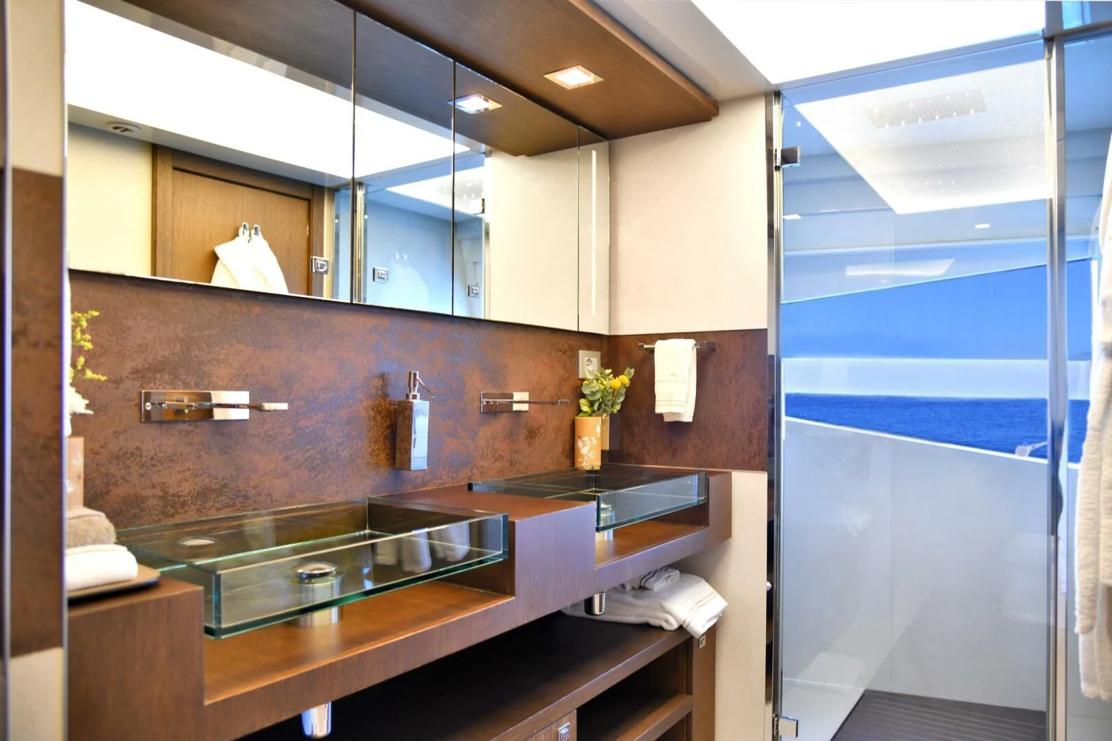 a kitchen with a sink and cabinets aboard INFINITAS Yacht for Charter