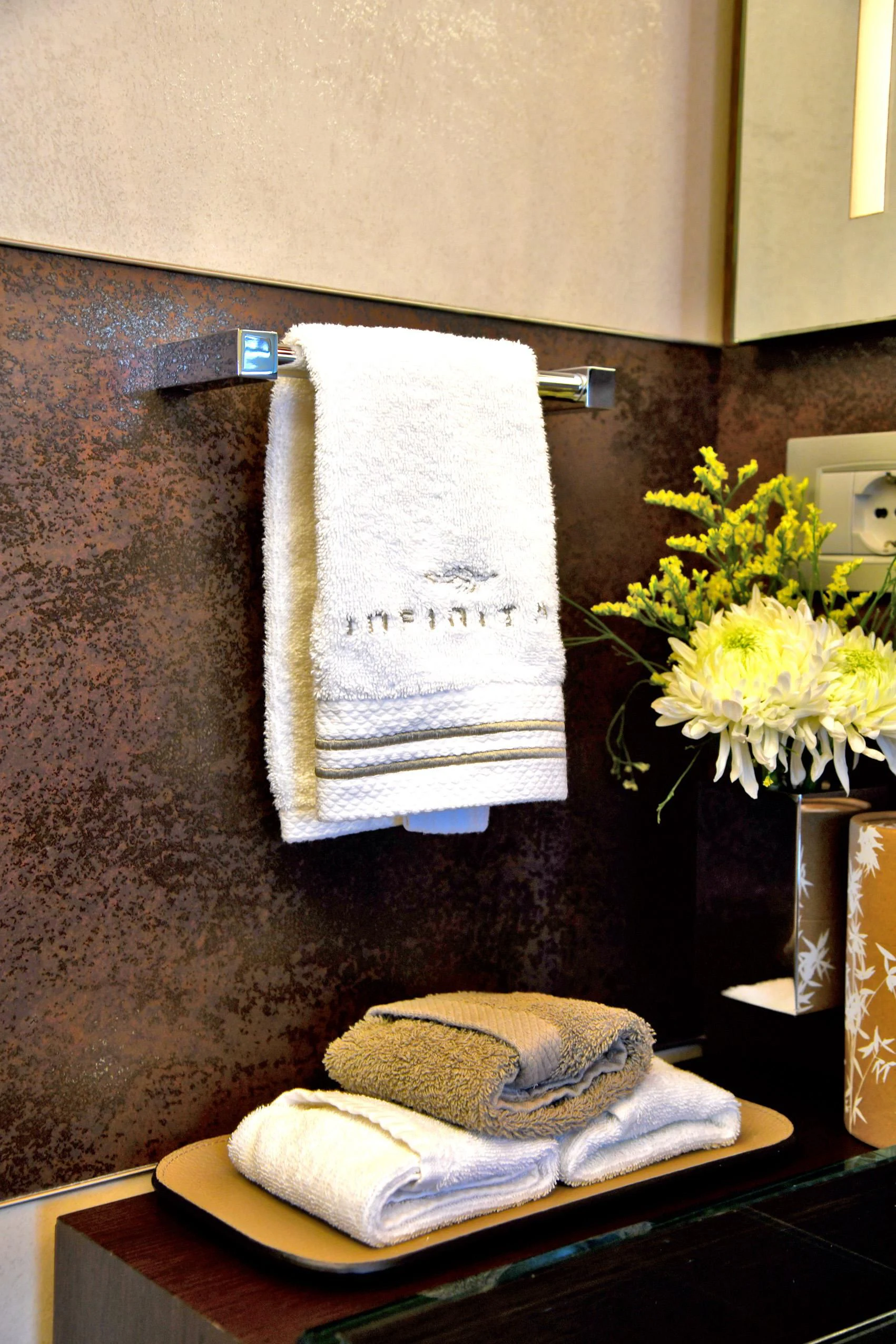 towels on a rack aboard INFINITAS Yacht for Charter