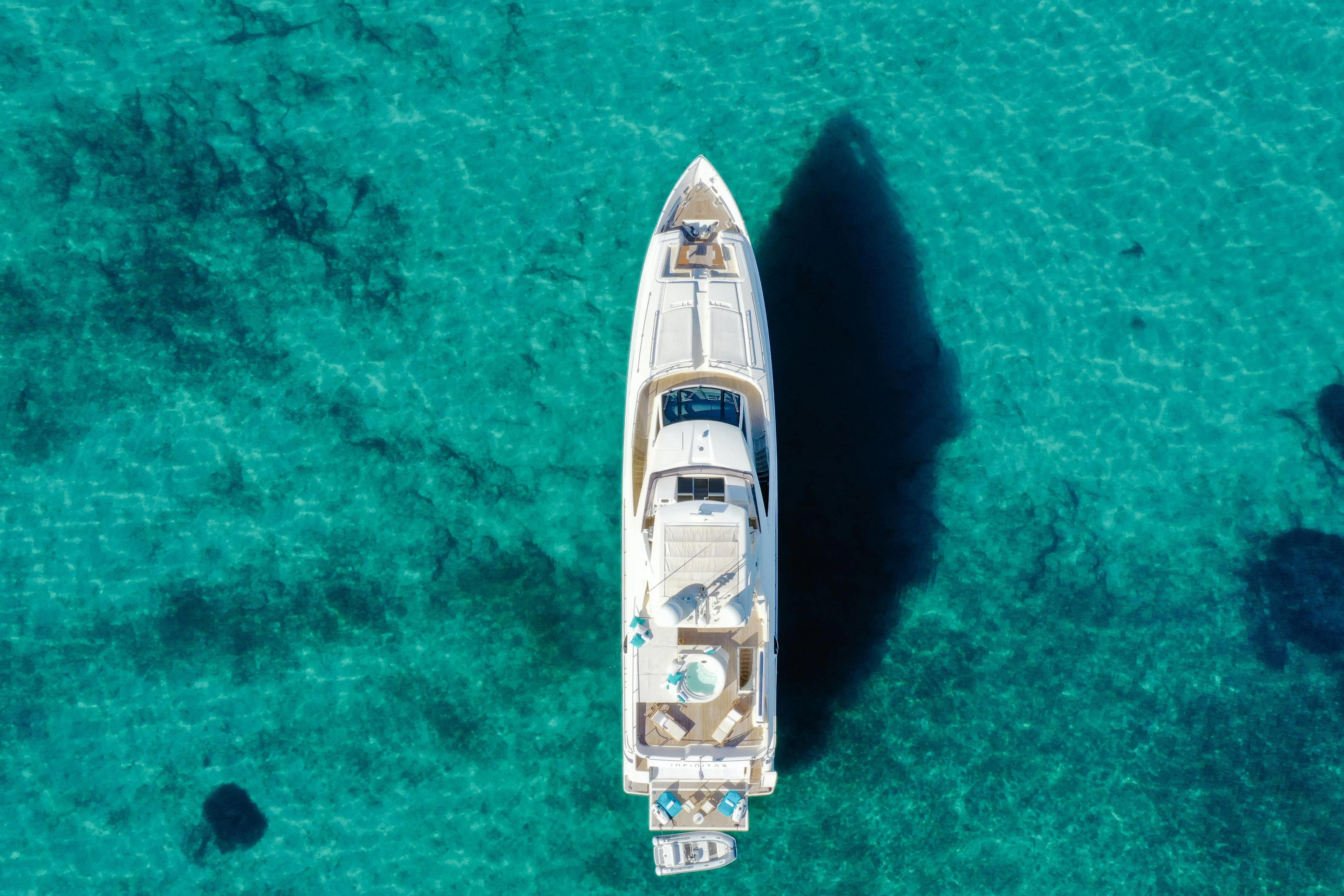 a boat in the water aboard INFINITAS Yacht for Charter