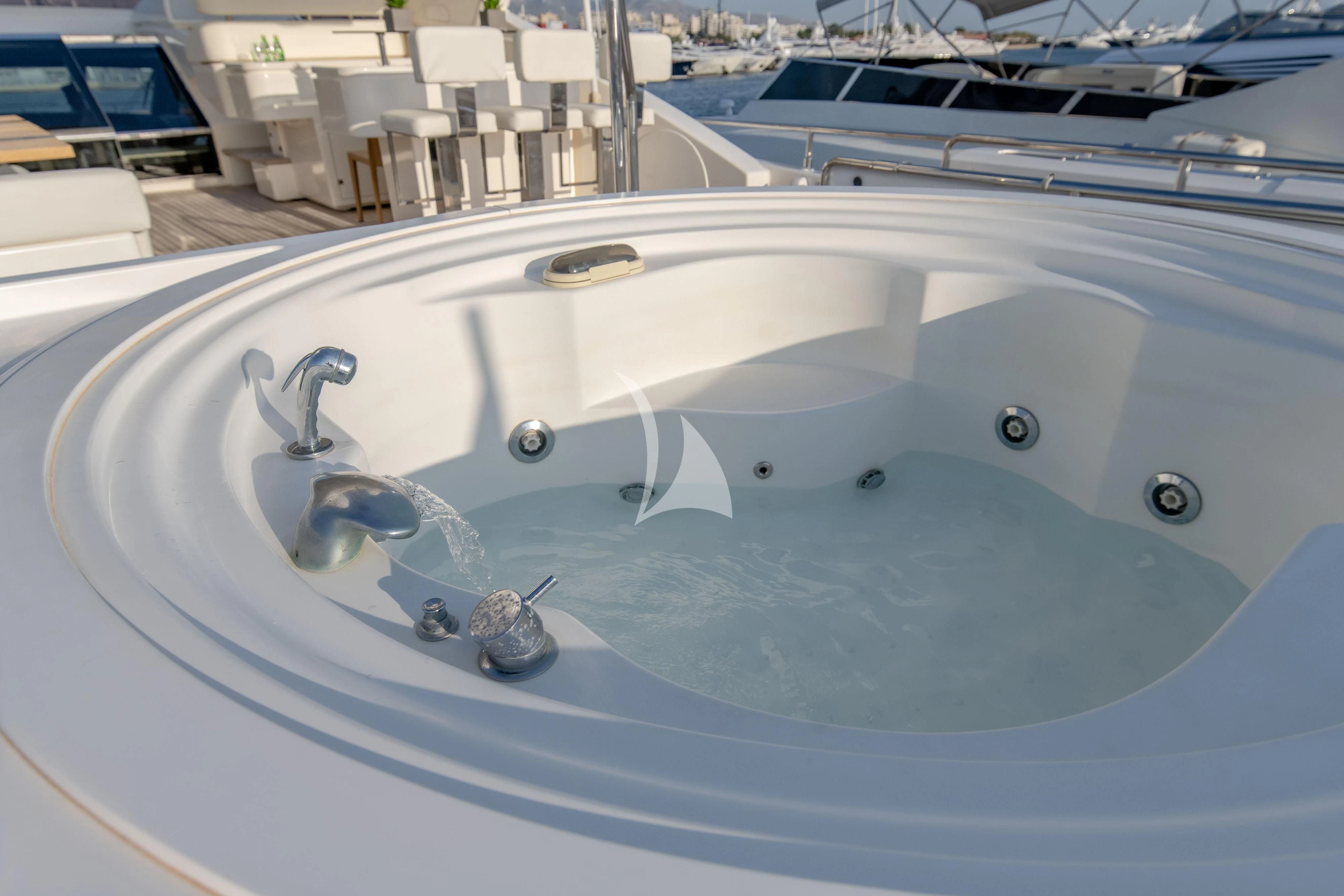 a large indoor swimming pool aboard INFINITAS Yacht for Charter
