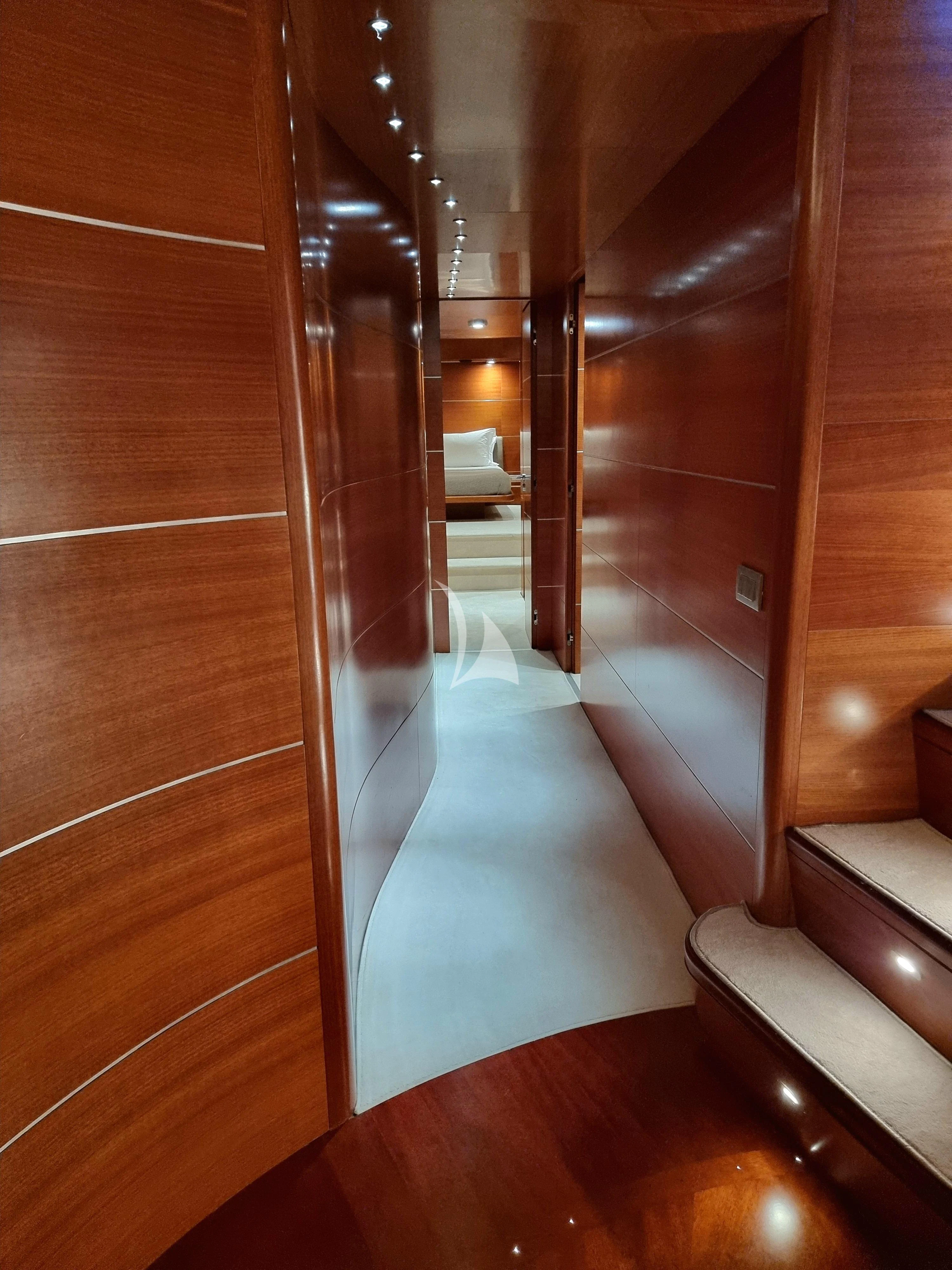 a room with wooden walls aboard SATORI Yacht for Sale