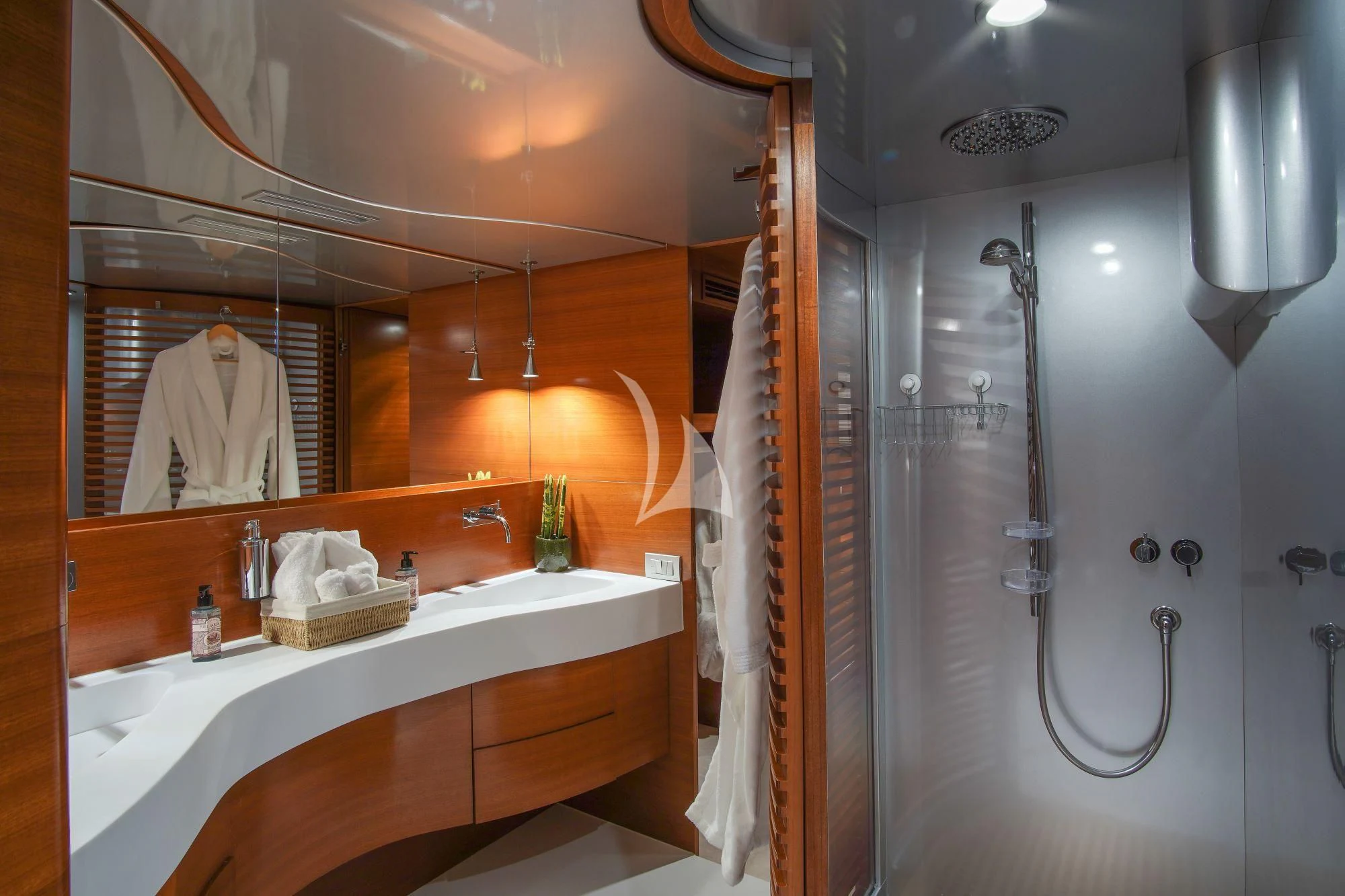 a bathroom with a large mirror aboard SATORI Yacht for Sale