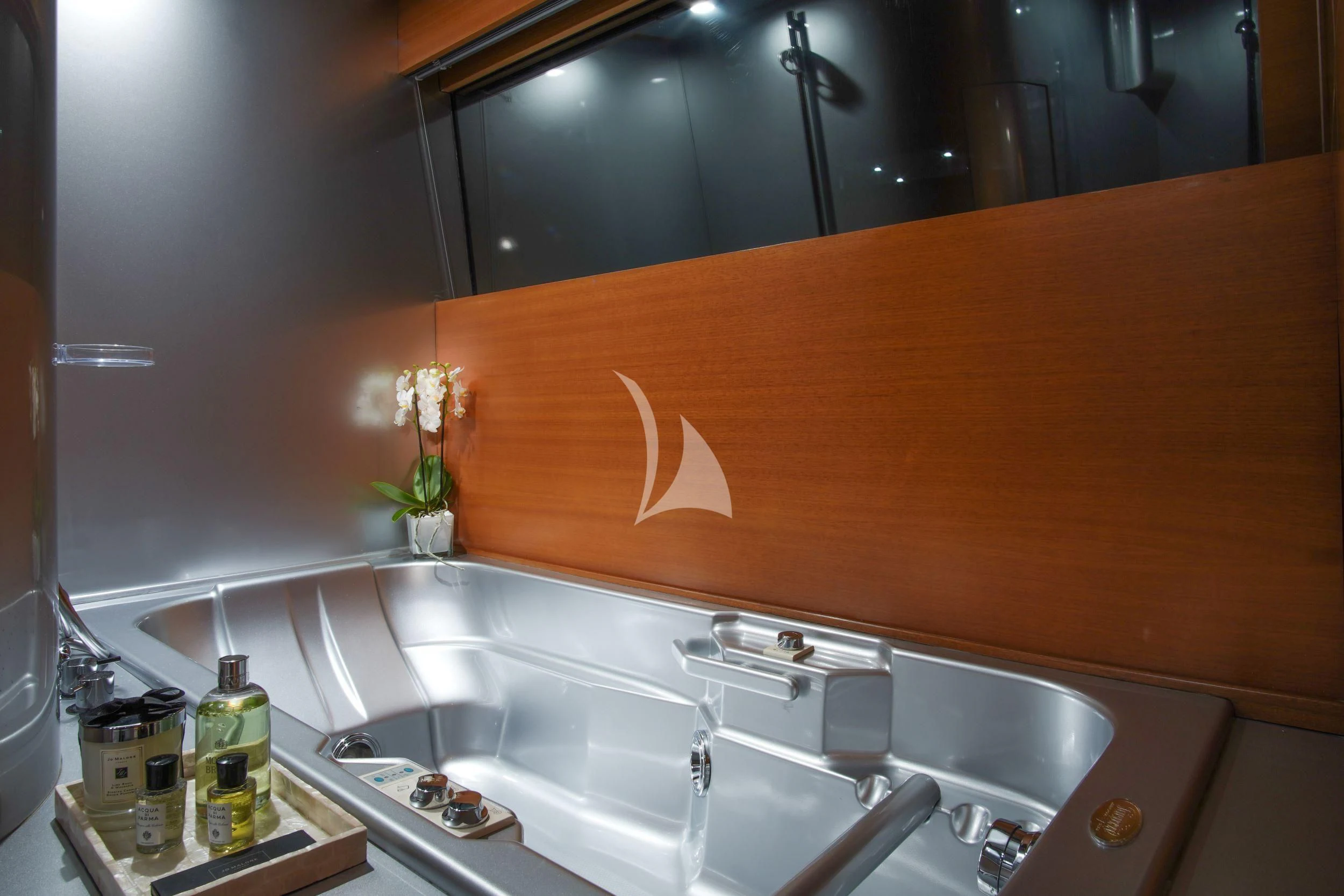 a bathroom with a sink and a mirror aboard SATORI Yacht for Sale
