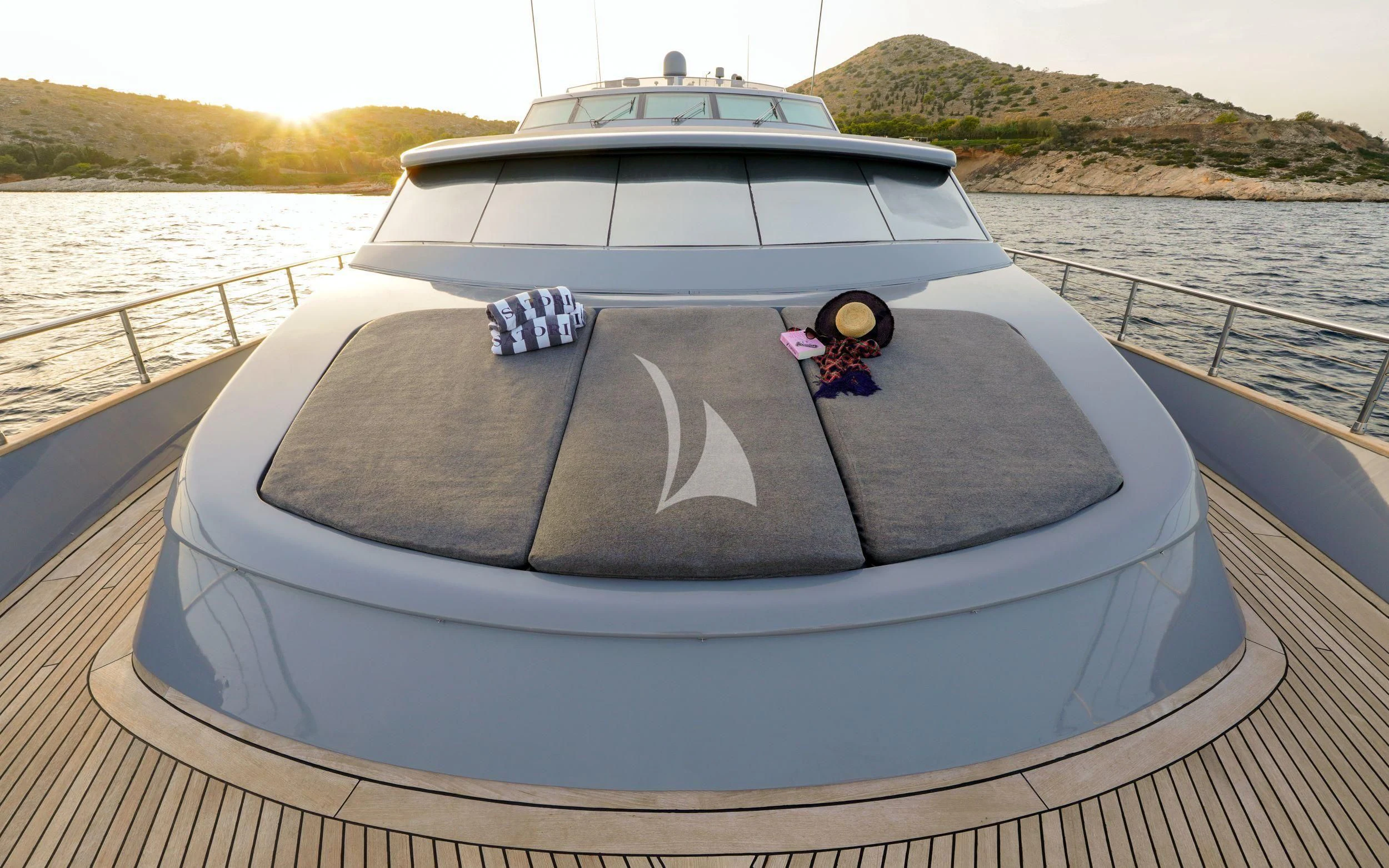 a boat on a lake aboard SATORI Yacht for Sale