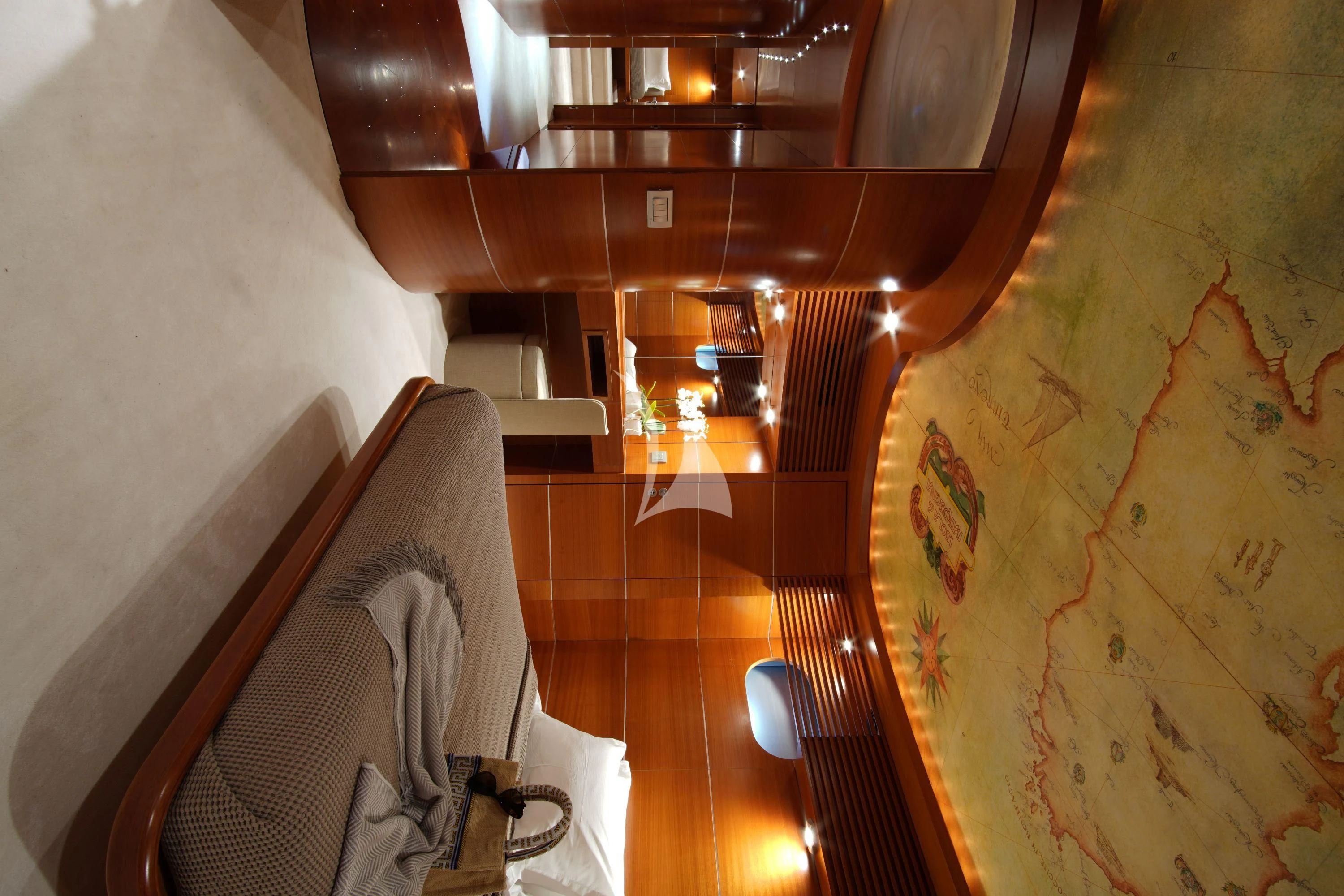 a room with a chair and a table and a couch aboard SATORI Yacht for Sale