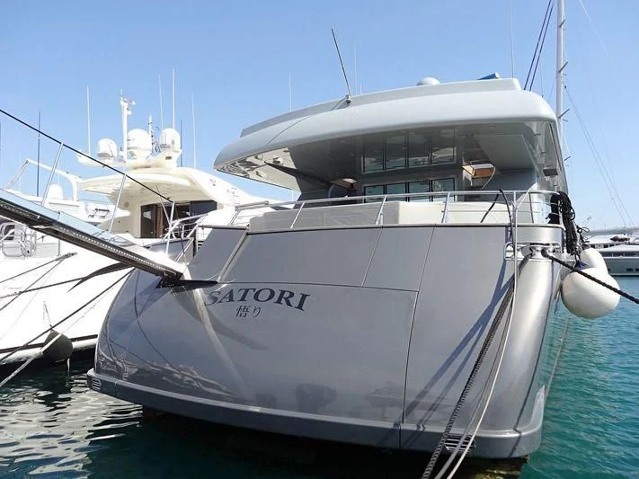 a white boat in the water aboard SATORI Yacht for Sale
