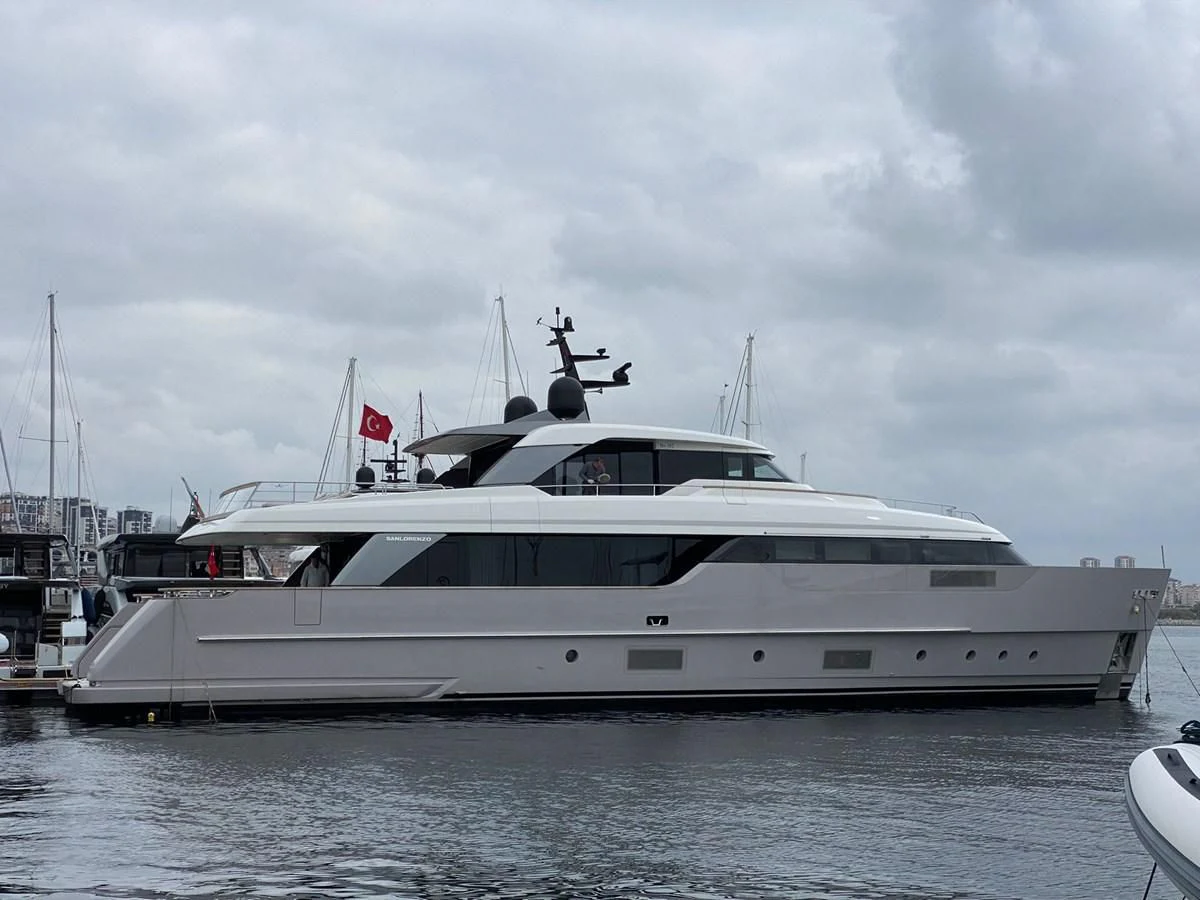 a yacht docked at a pier aboard FLORI Yacht for Sale