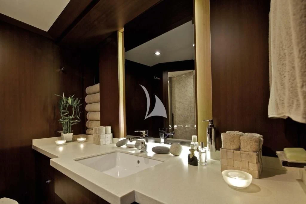 a bathroom with a large mirror aboard SANJANA Yacht for Sale