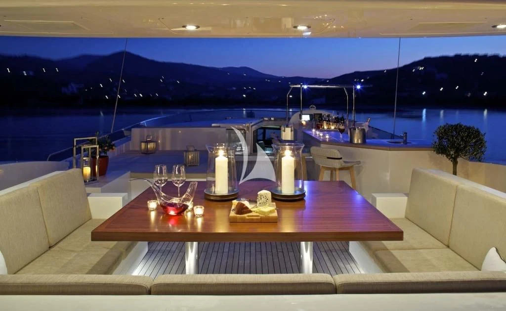 a table with candles on it aboard SANJANA Yacht for Sale