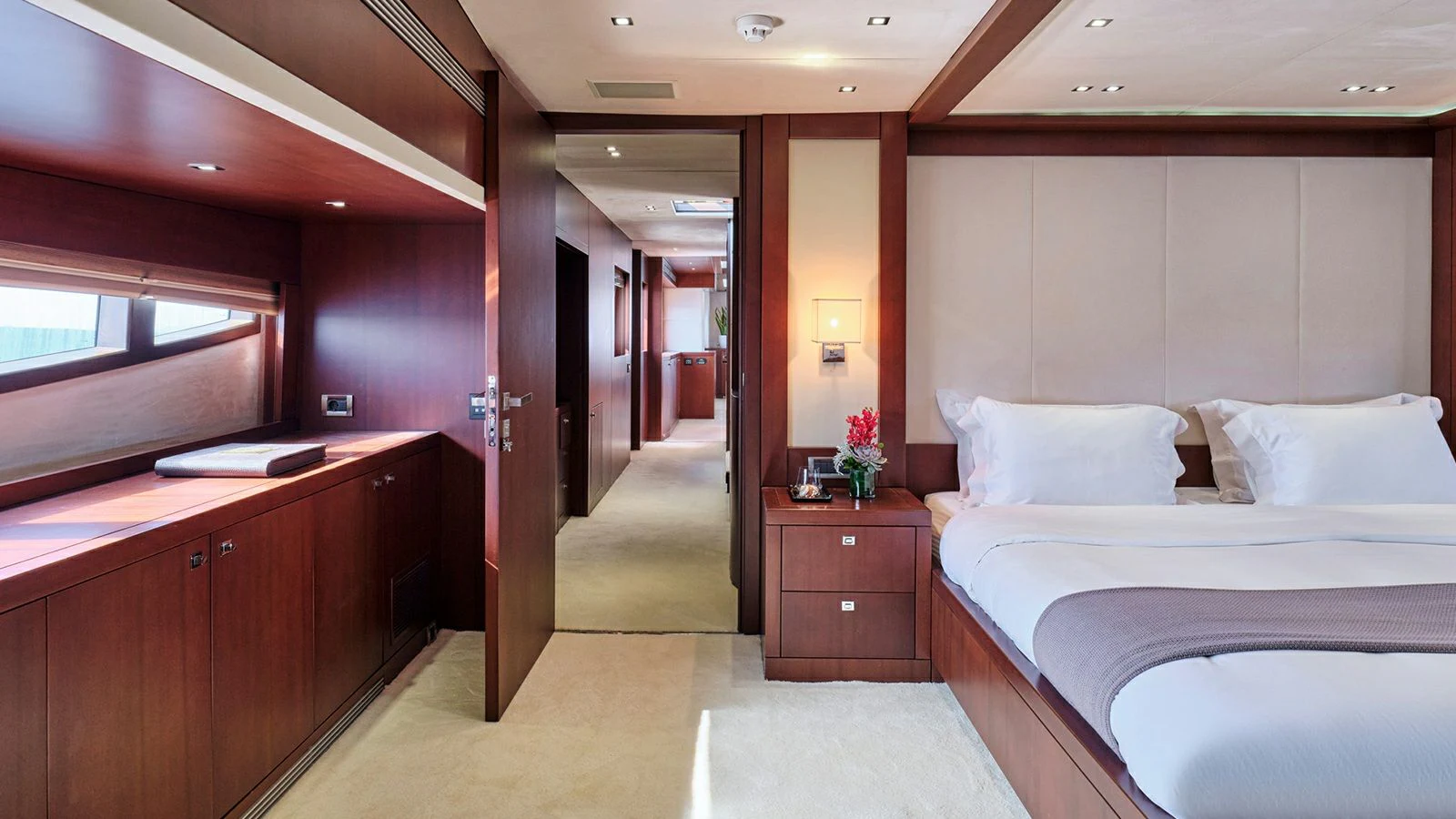 a room with a bed and a desk aboard SANJANA Yacht for Sale