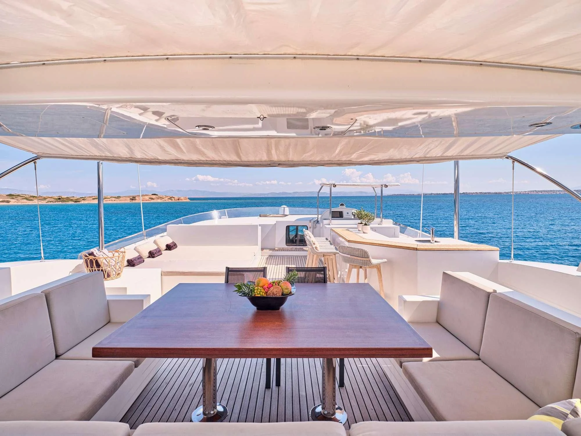 a table on a balcony aboard SANJANA Yacht for Sale