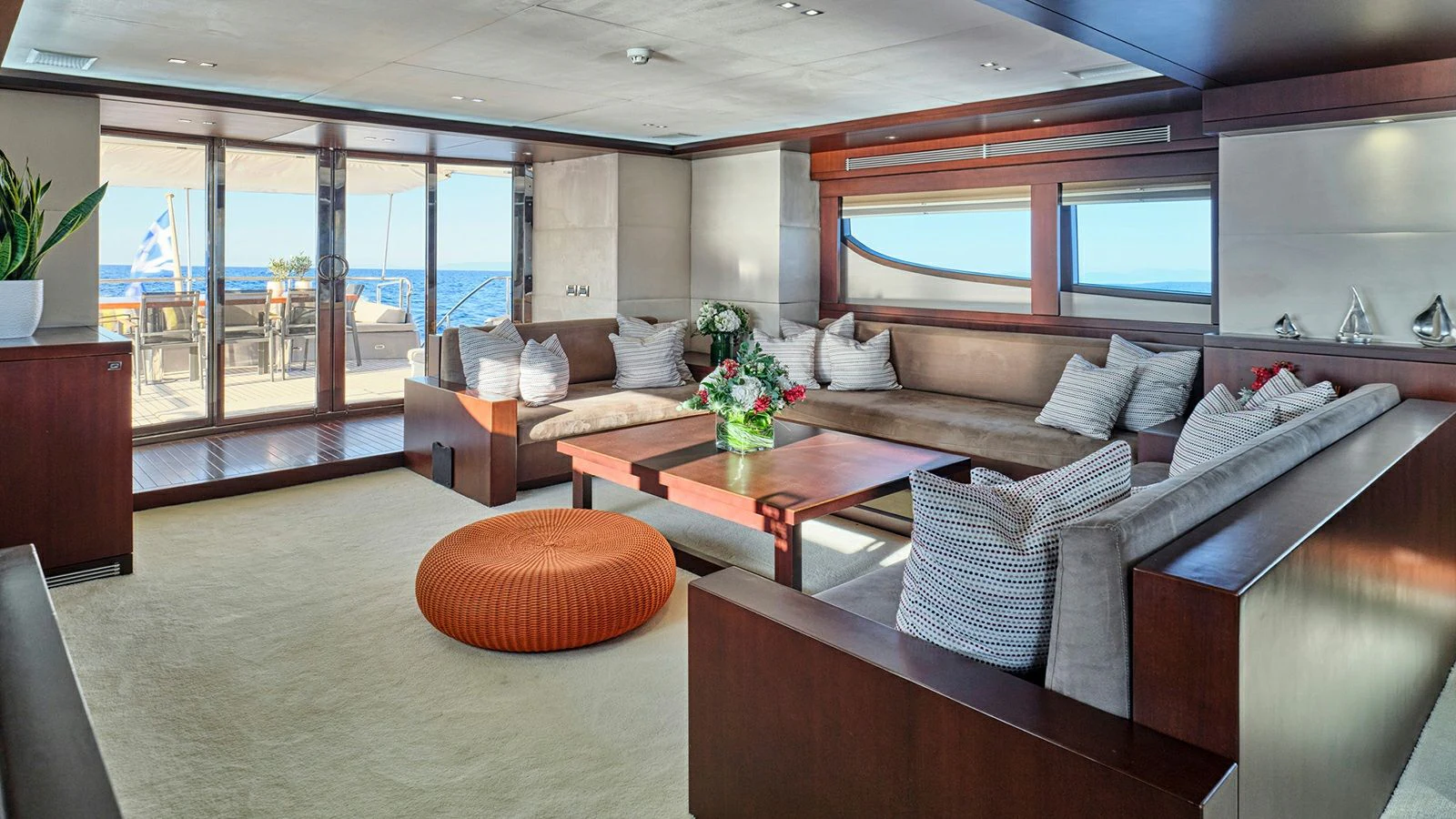 a living room with a large window aboard SANJANA Yacht for Sale