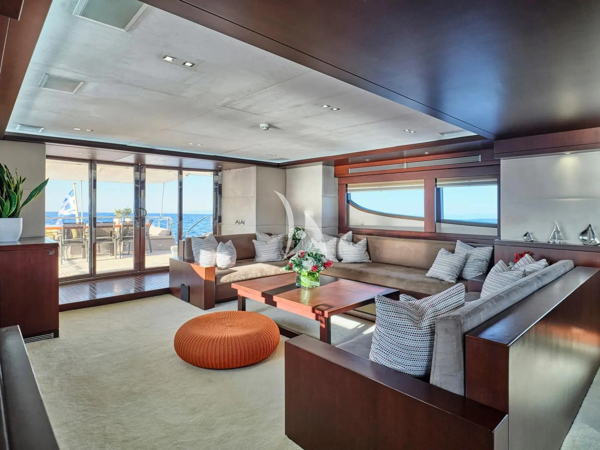 a living room with a large window aboard SANJANA Yacht for Sale