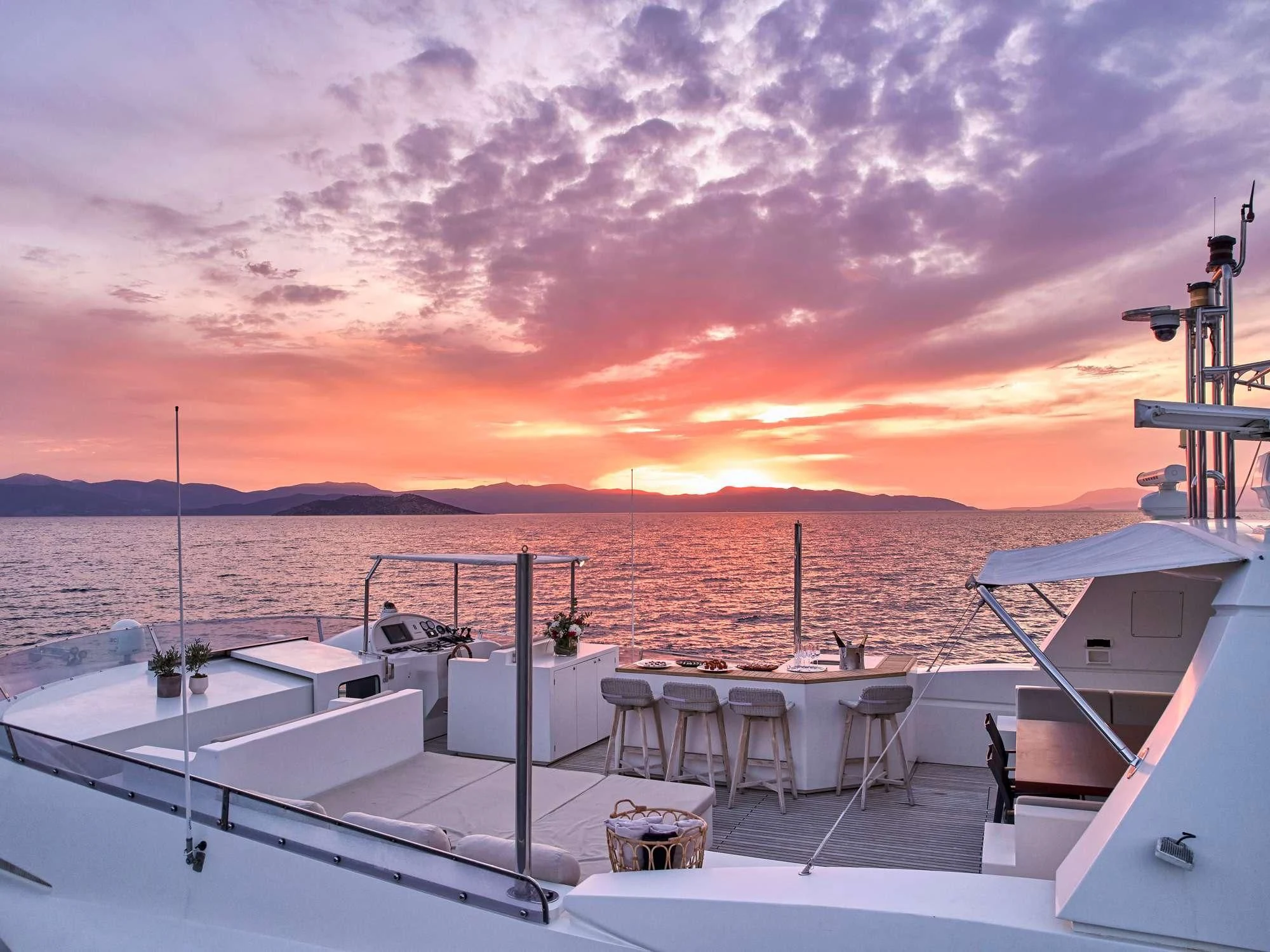 a sunset over a body of water aboard SANJANA Yacht for Sale