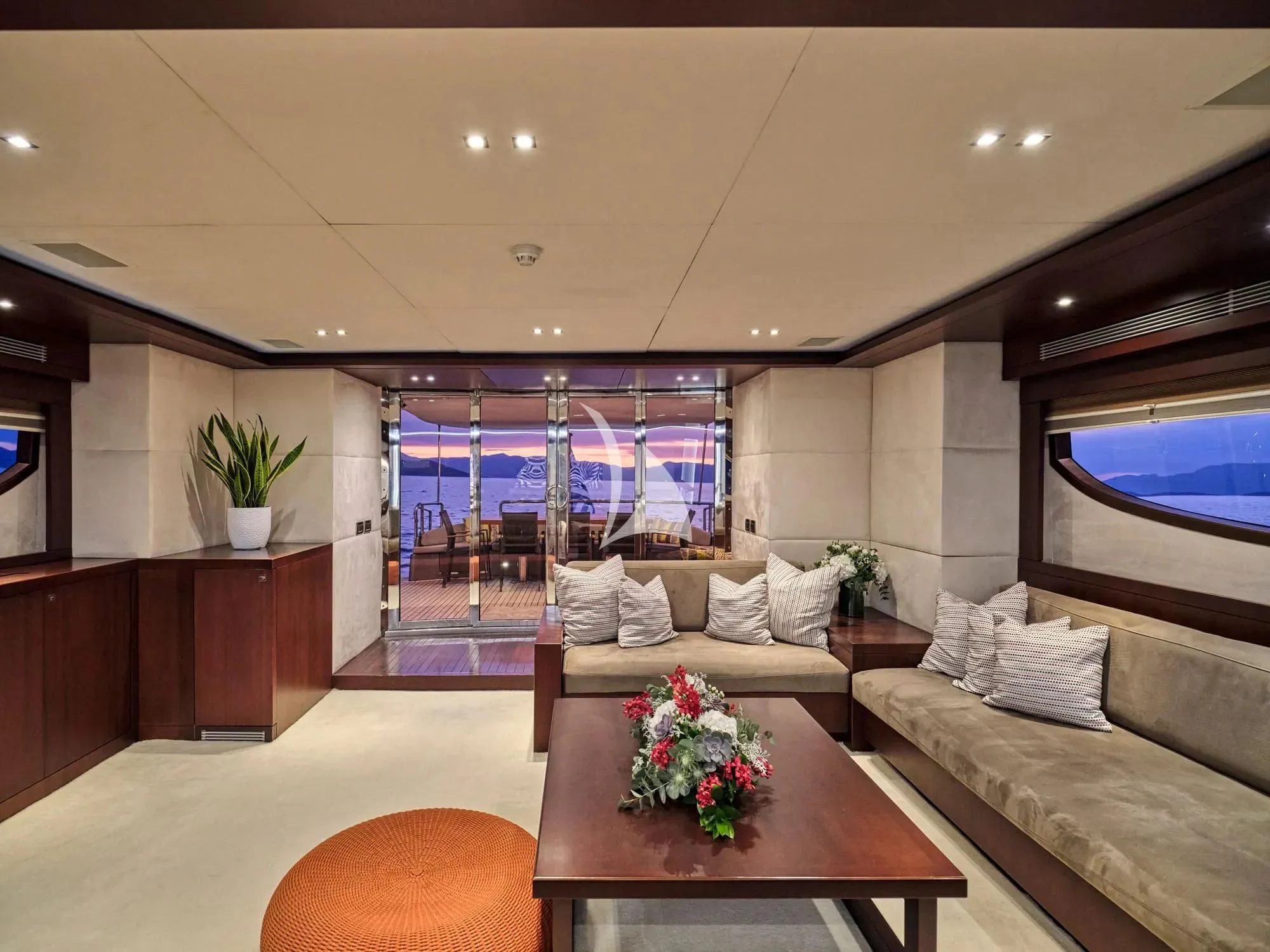 a living room with a large window aboard SANJANA Yacht for Sale