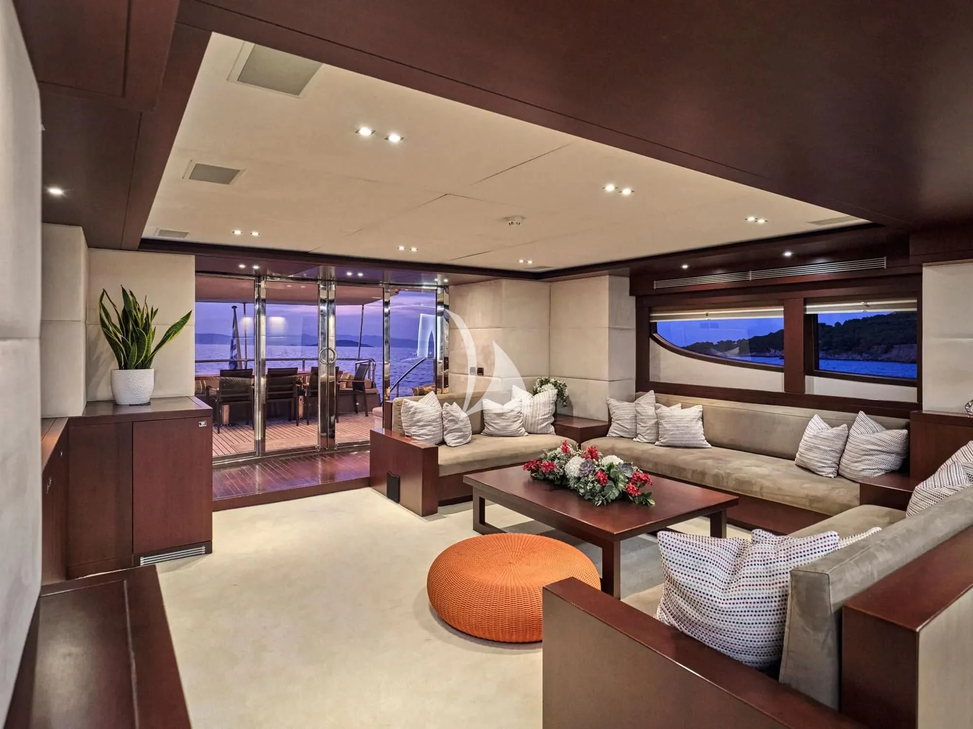 a living room with a large window aboard SANJANA Yacht for Sale