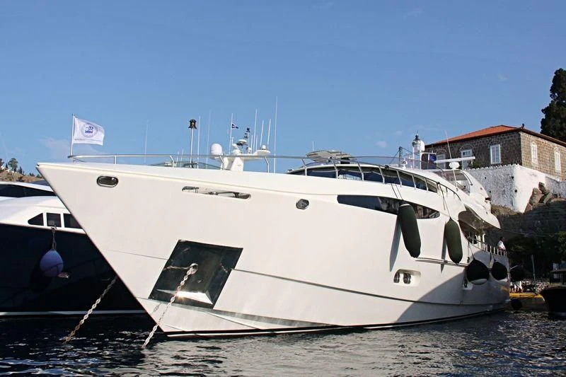 a white yacht on the water aboard SANJANA Yacht for Sale