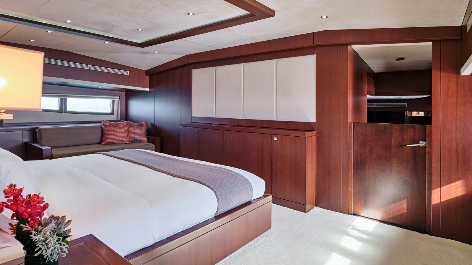 a room with a bed and a couch aboard SANJANA Yacht for Sale