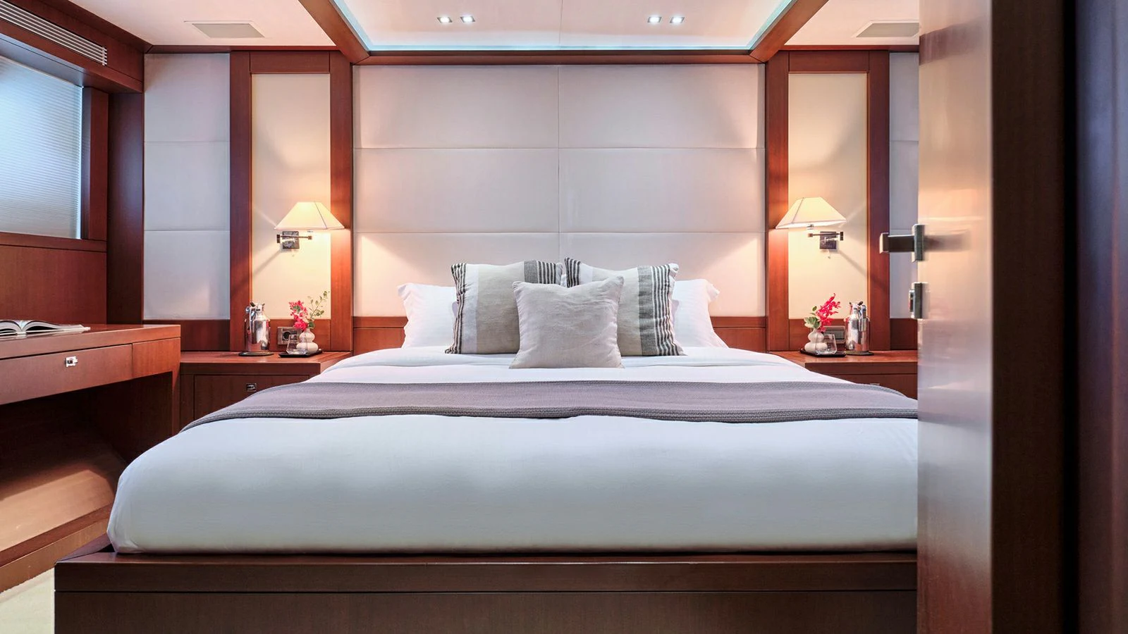 a bed with a white sheet aboard SANJANA Yacht for Sale