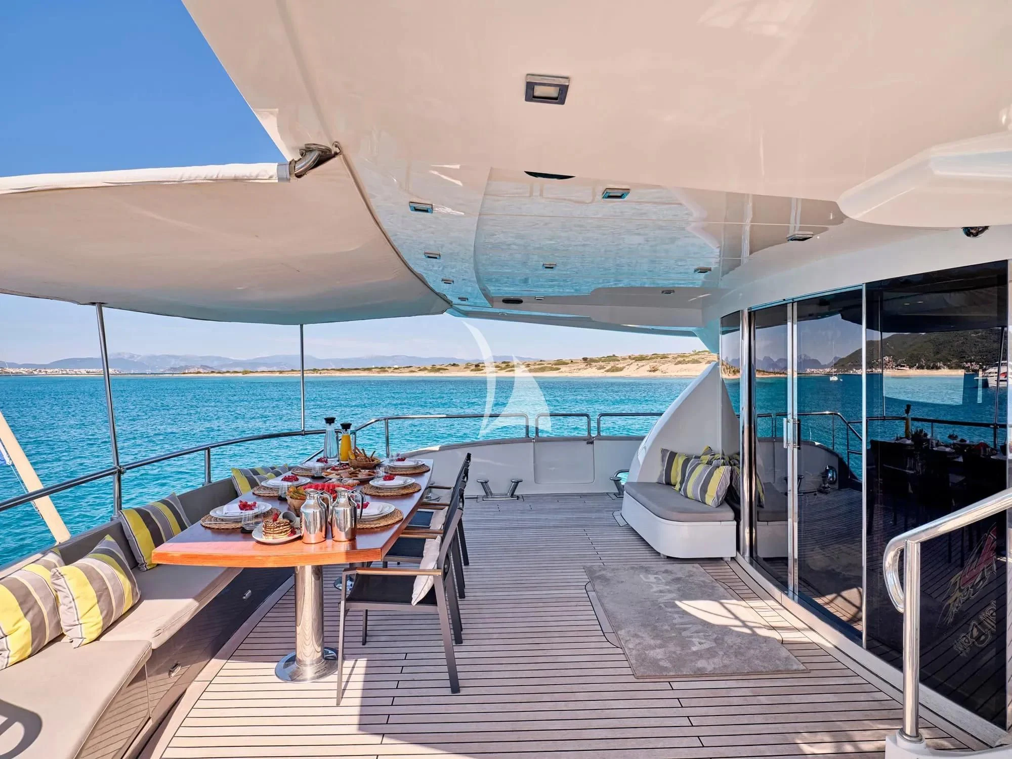 a boat on a deck aboard SANJANA Yacht for Sale