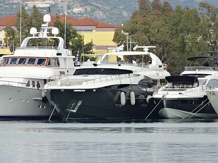 several boats docked at a pier aboard SANJANA Yacht for Sale