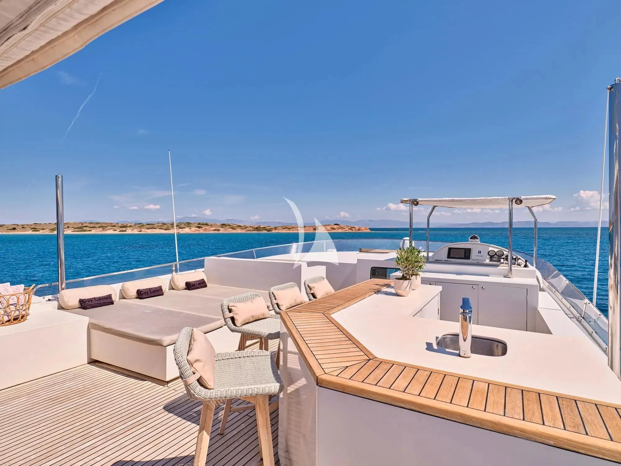 a deck with chairs and a pool aboard SANJANA Yacht for Sale