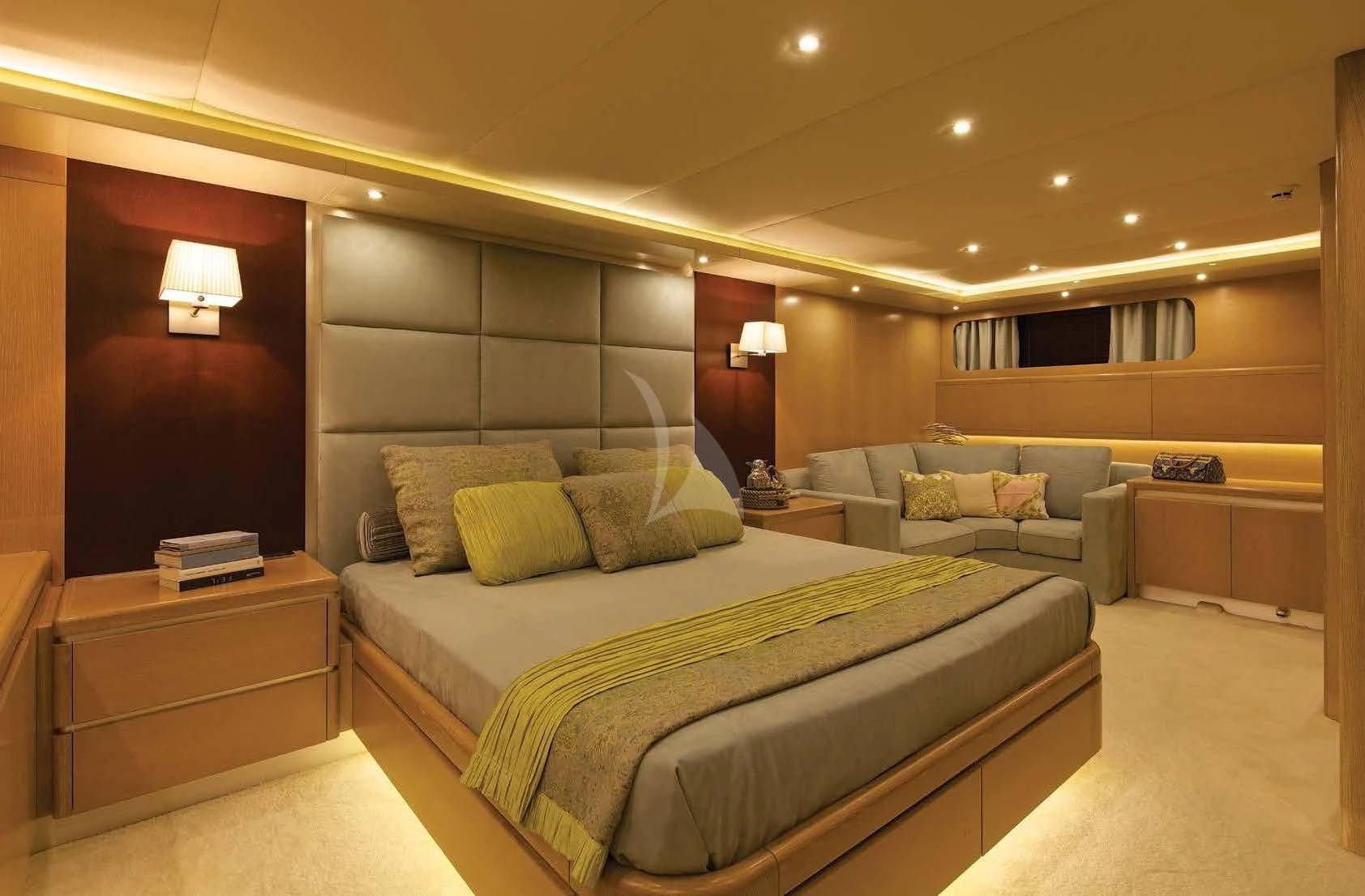 a large bedroom with a bed and a couch aboard MAGIX Yacht for Sale
