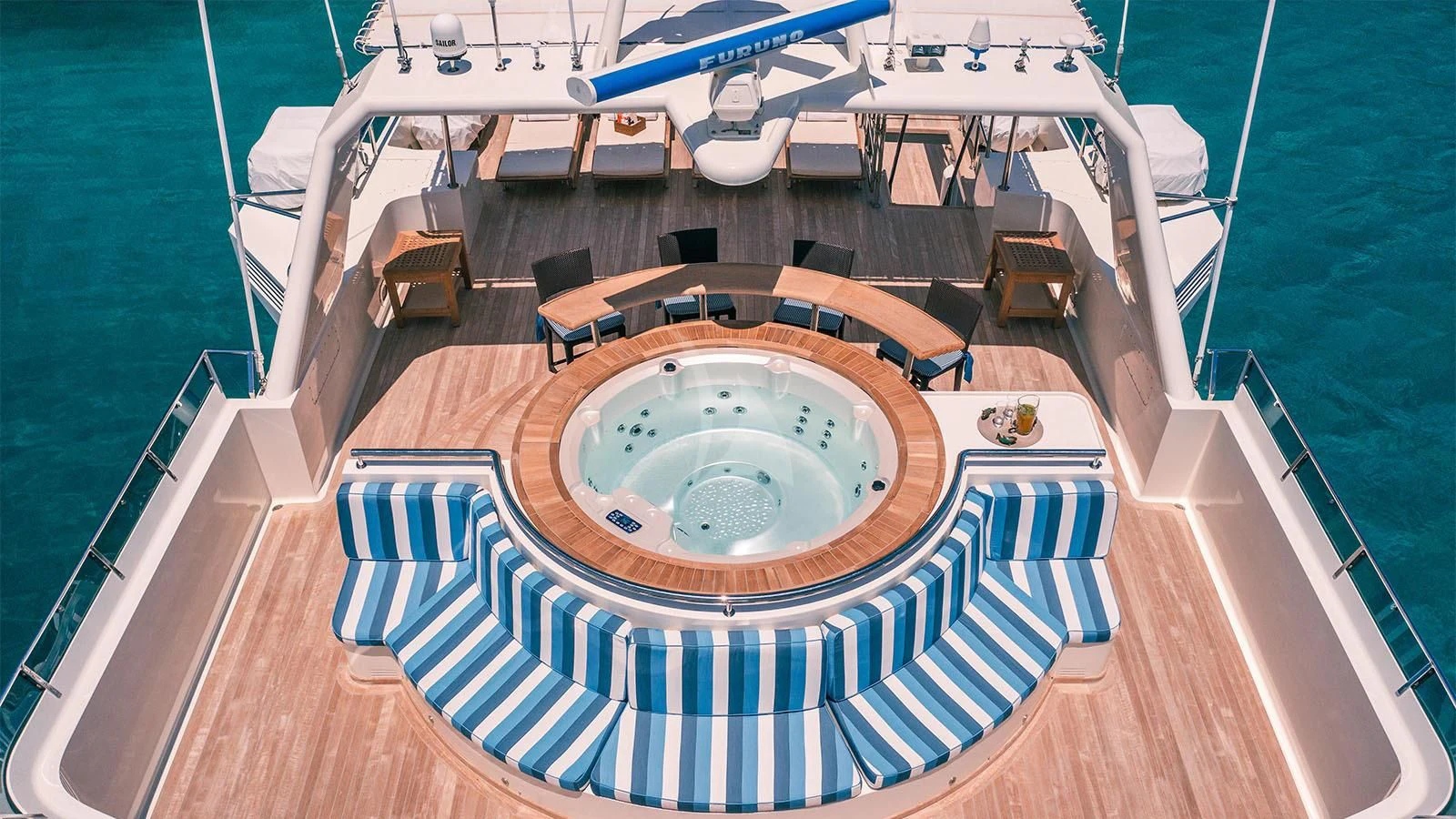 a large pool with a deck aboard MAGIX Yacht for Sale