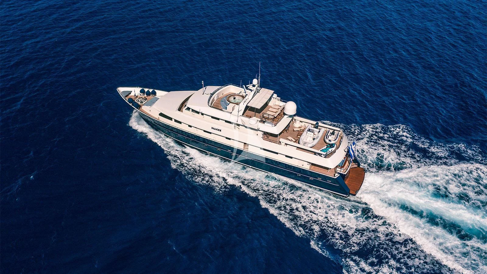 a boat on the water aboard MAGIX Yacht for Sale