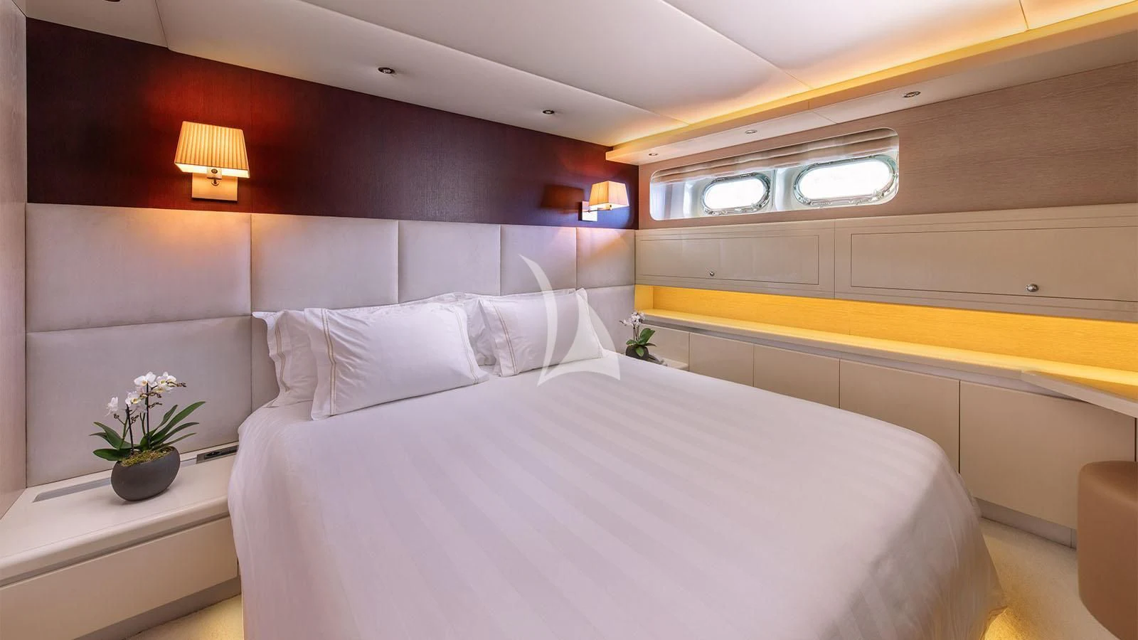 a room with a bed and a plant aboard MAGIX Yacht for Sale