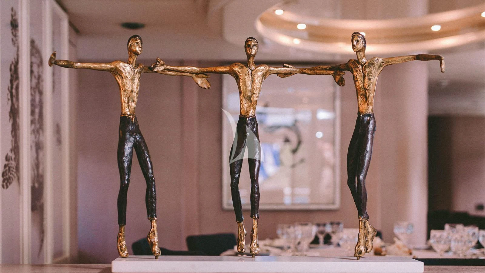 a statue of a man and woman aboard MAGIX Yacht for Sale