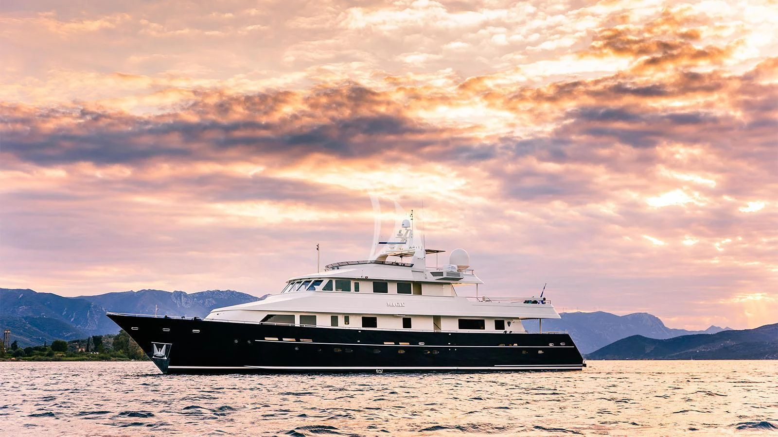 a boat on a beach aboard MAGIX Yacht for Sale