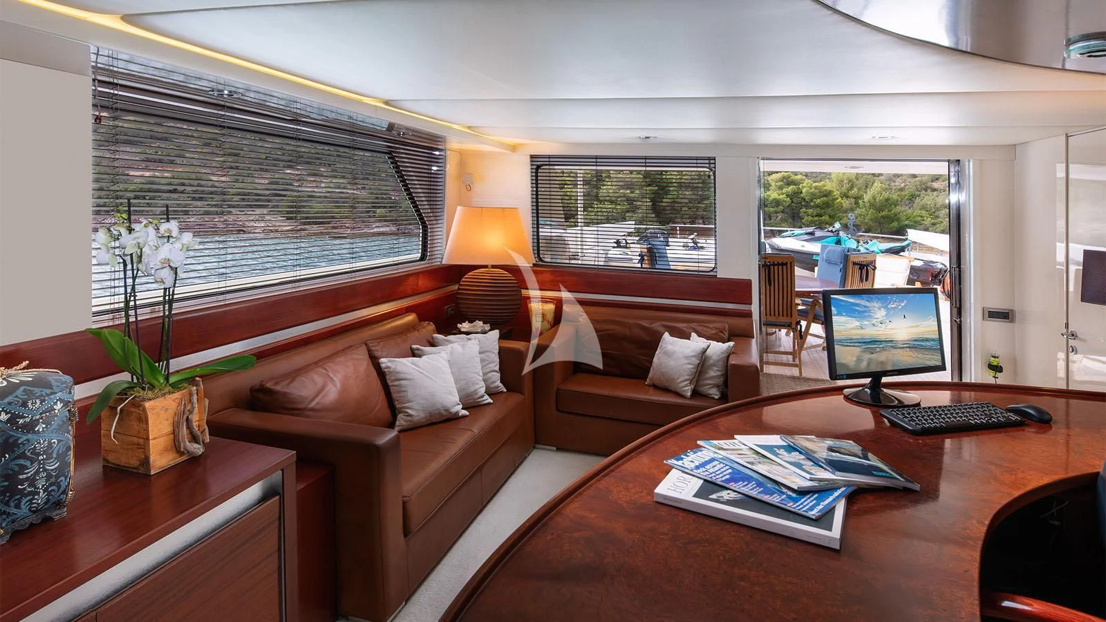 a living room with a large window aboard MAGIX Yacht for Sale