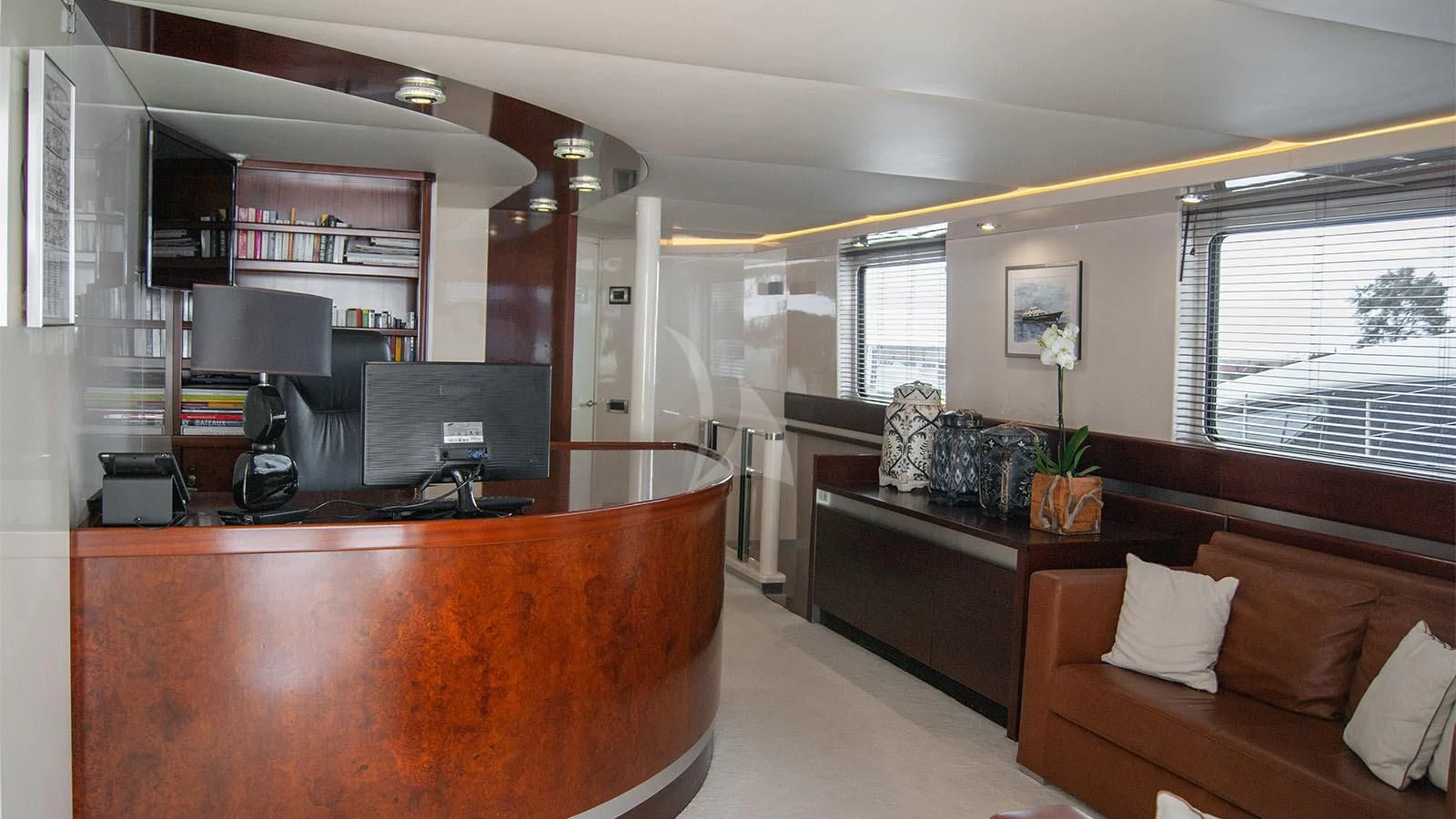 a living room with a couch and a tv aboard MAGIX Yacht for Sale