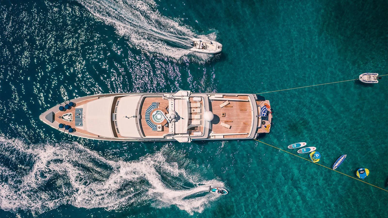 a satellite in space above a planet aboard MAGIX Yacht for Sale