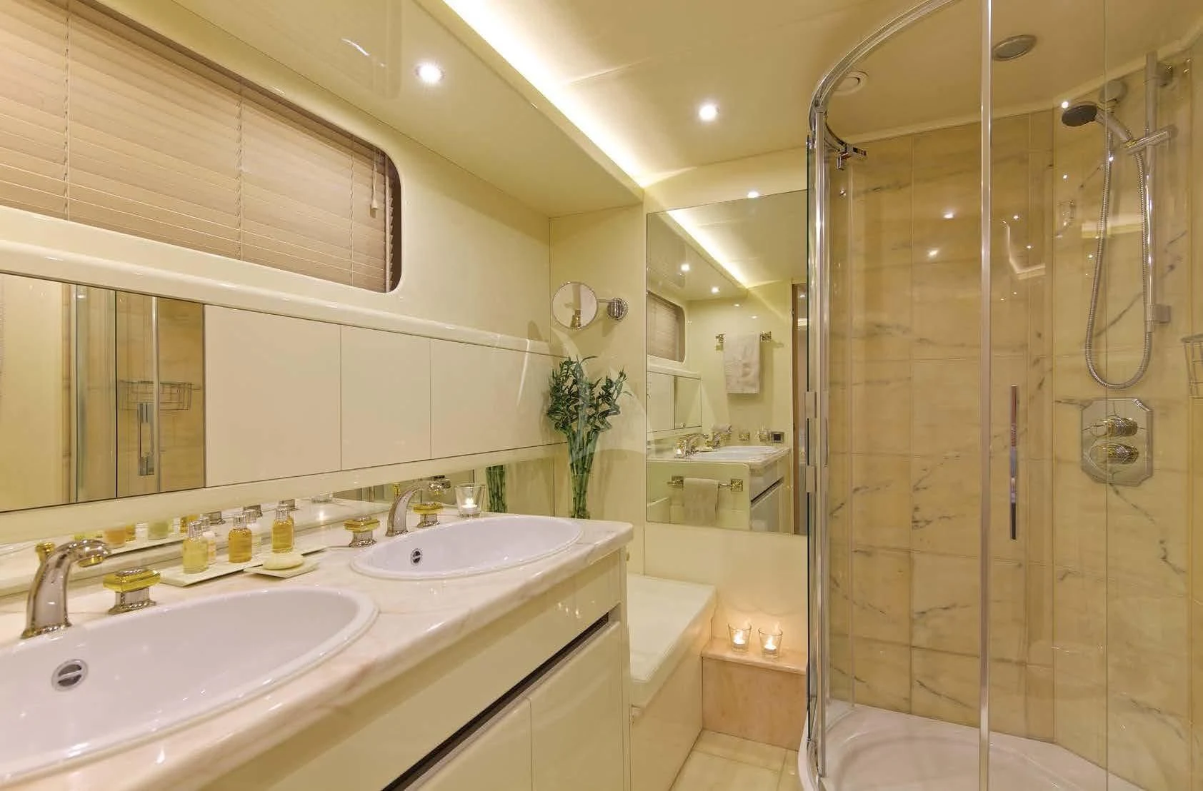 a bathroom with a shower and sink aboard MAGIX Yacht for Sale