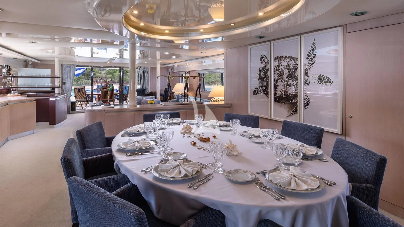 a large dining room with a large table and chairs aboard MAGIX Yacht for Sale