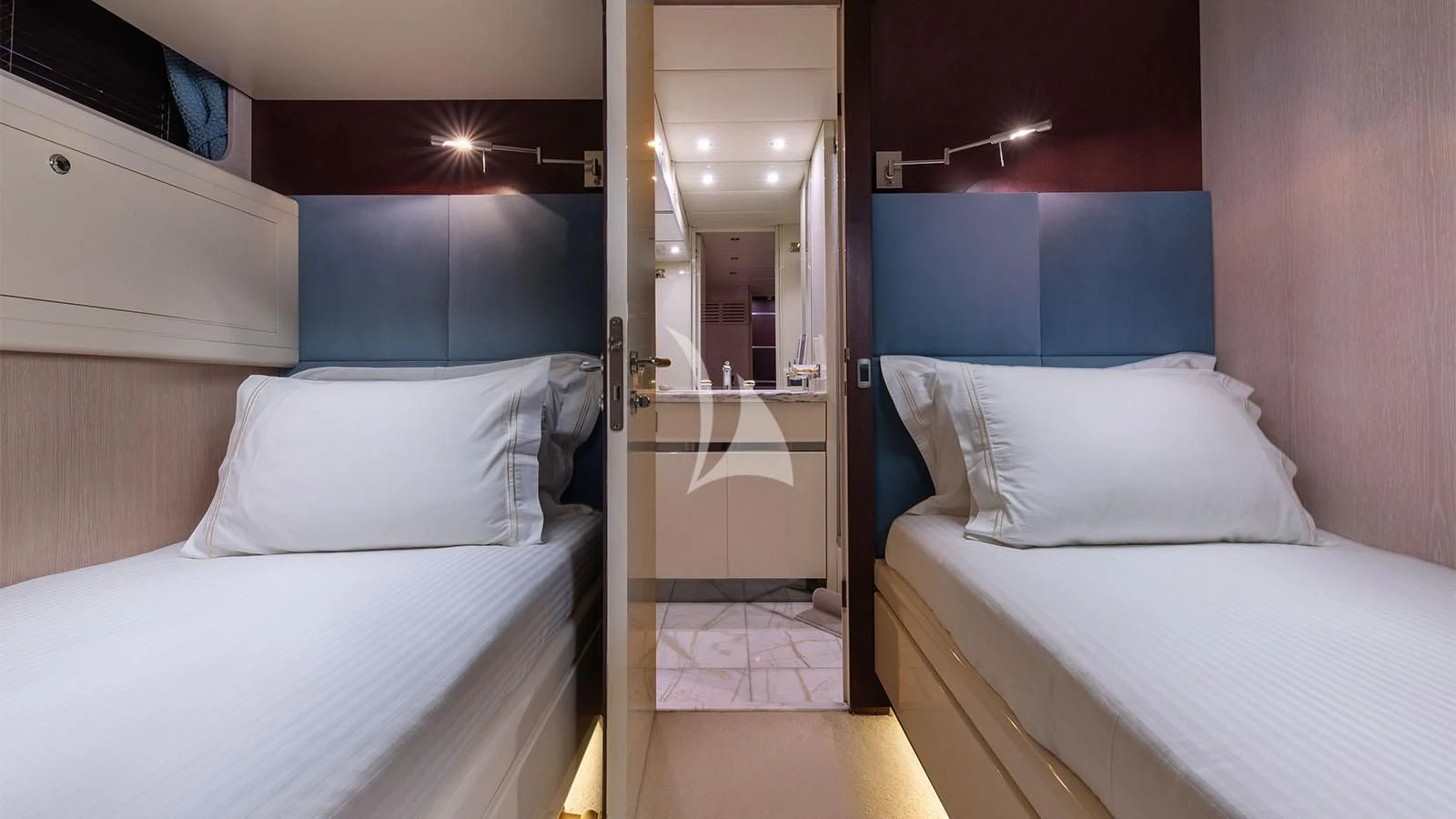 a room with beds and a mirror aboard MAGIX Yacht for Sale