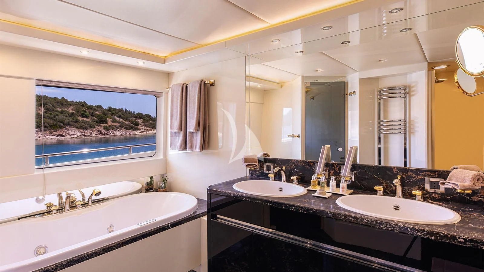a bathroom with a large mirror aboard MAGIX Yacht for Sale