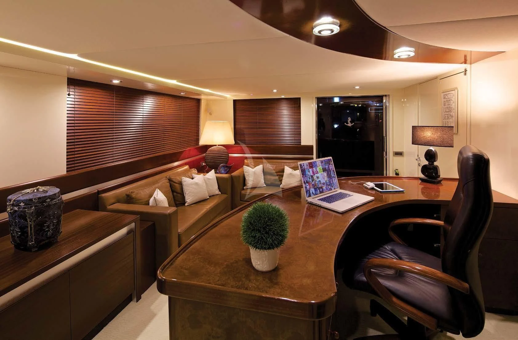 a living room with a couch and a table aboard MAGIX Yacht for Sale